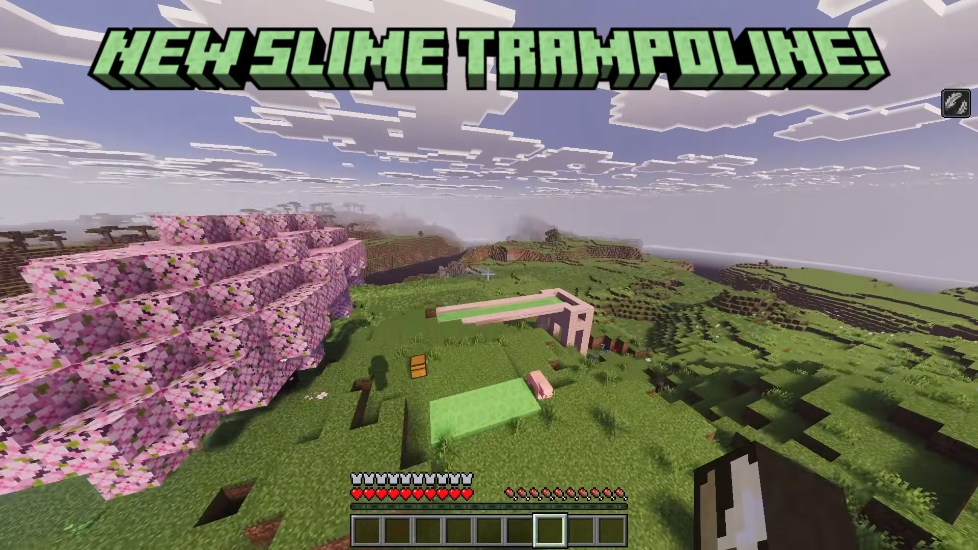 Aerial view of a new slime trampoline near cherry blossom trees