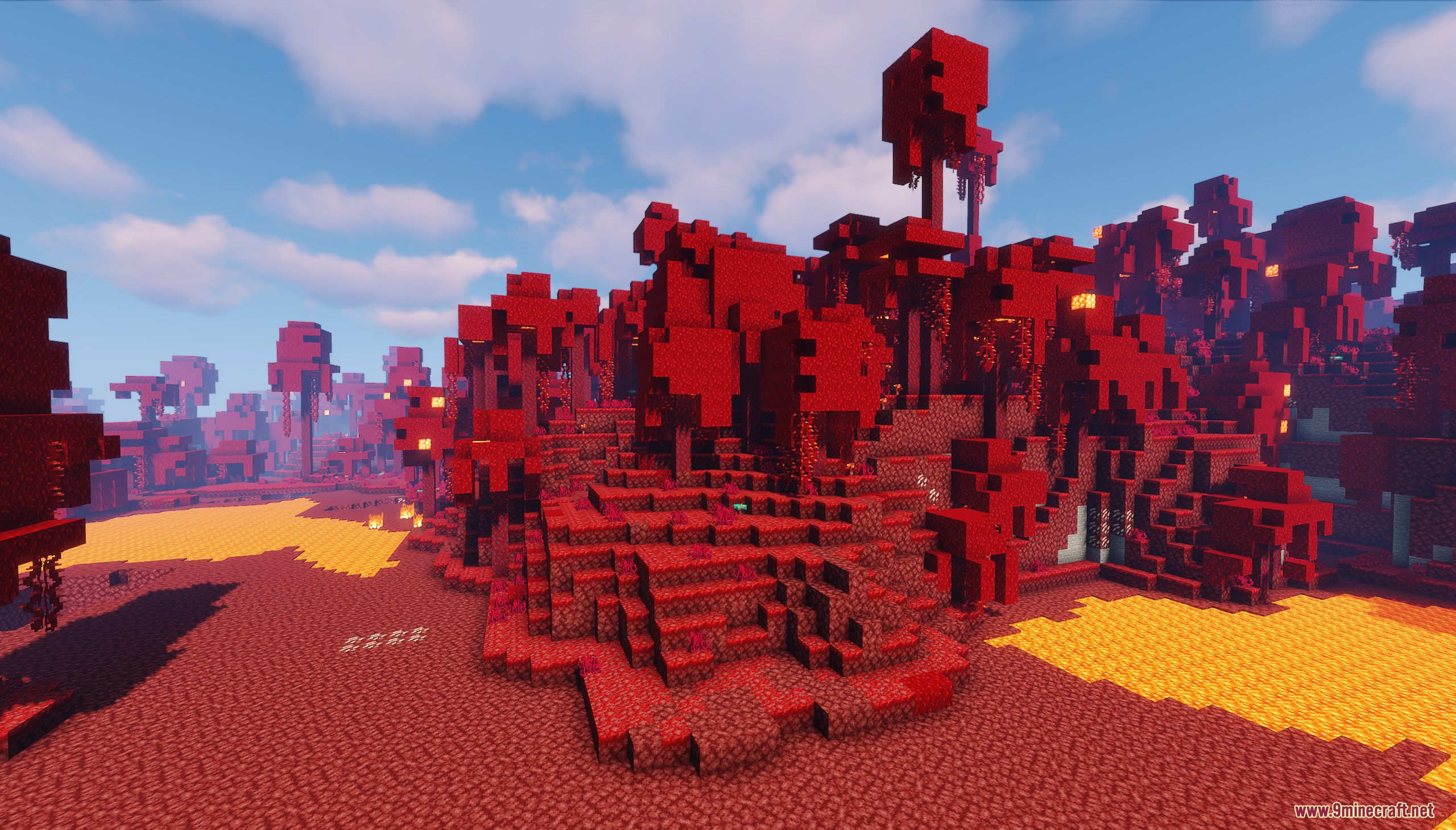 The red crimson landscape bordering a large pool of lava