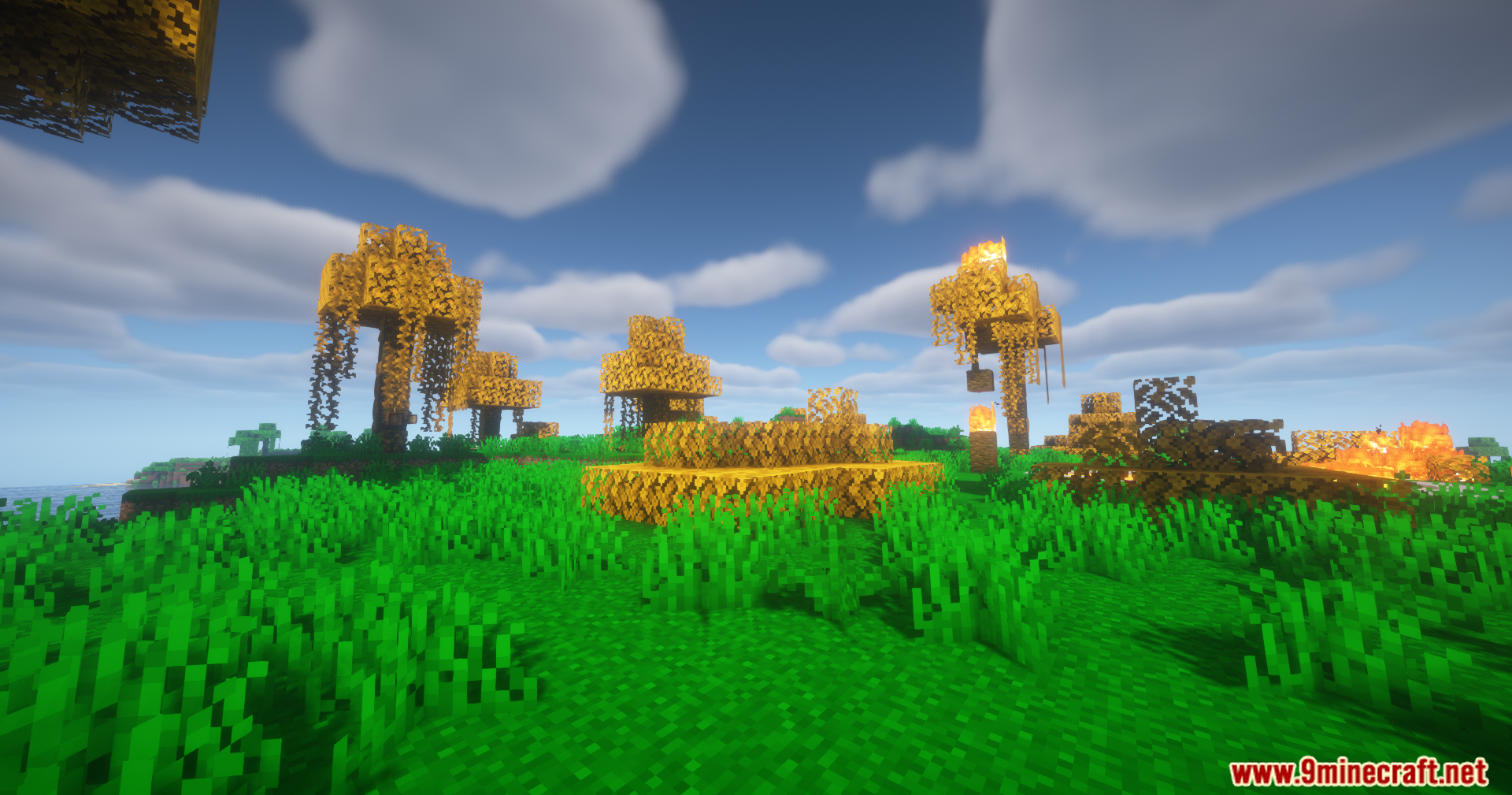 Weather Gate Mod Screenshot 12 Minecraft landscape showing a forest with bright orange autumn leaves
