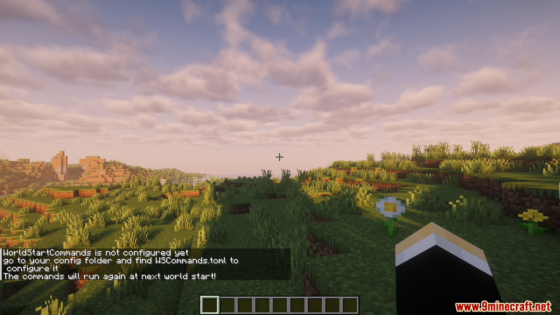 Game chat displaying a configuration warning message for new worlds