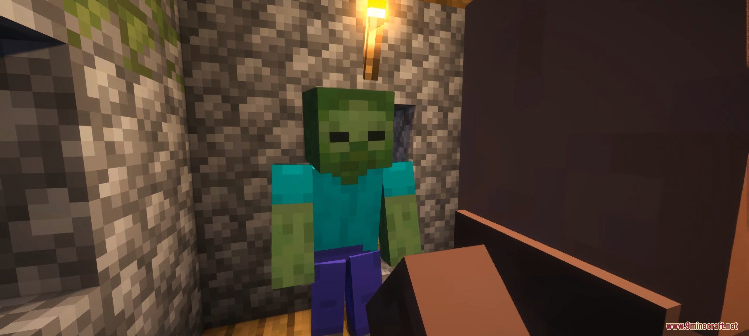 A zombie stands alone in a dimly lit room