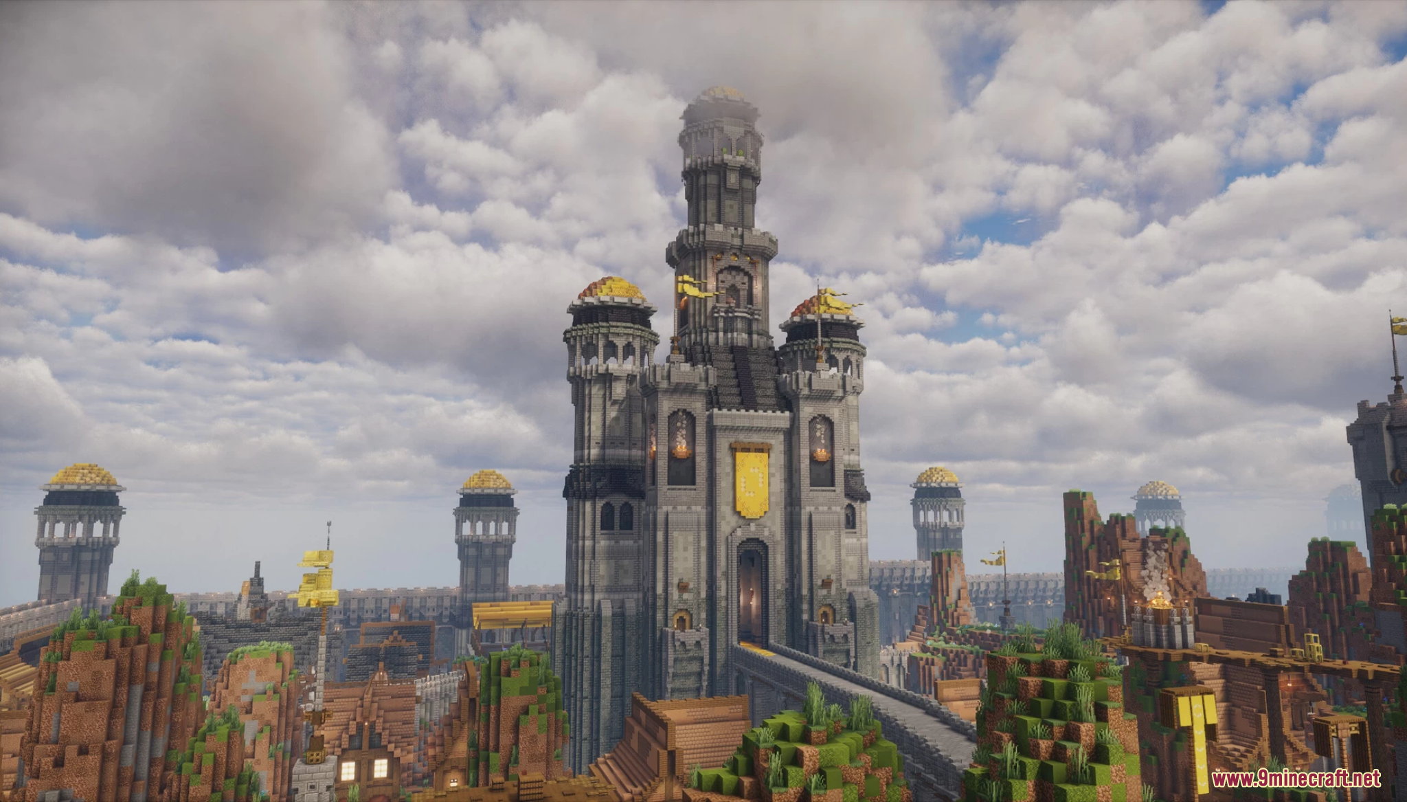 A grand medieval stone castle with golden-domed towers