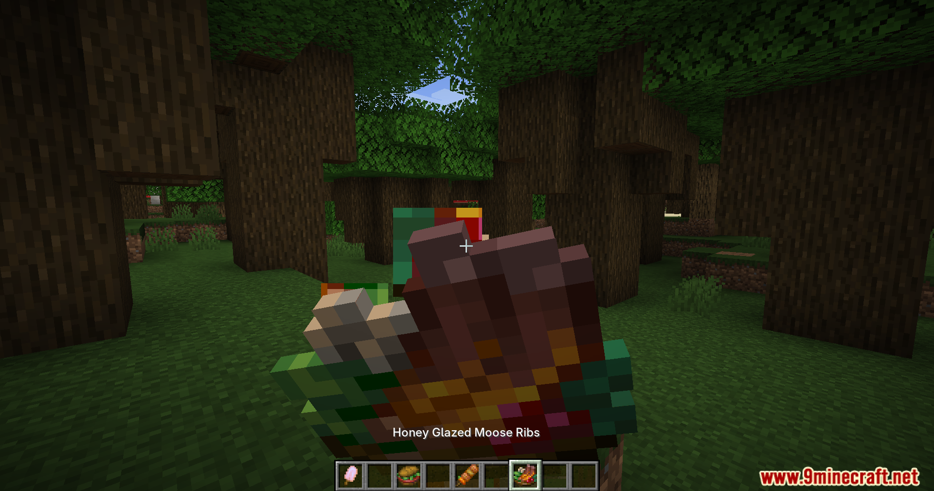 Alexs Mobs Delight Mod Screenshot 10 Player holding the Honey Glazed Moose Ribs food item