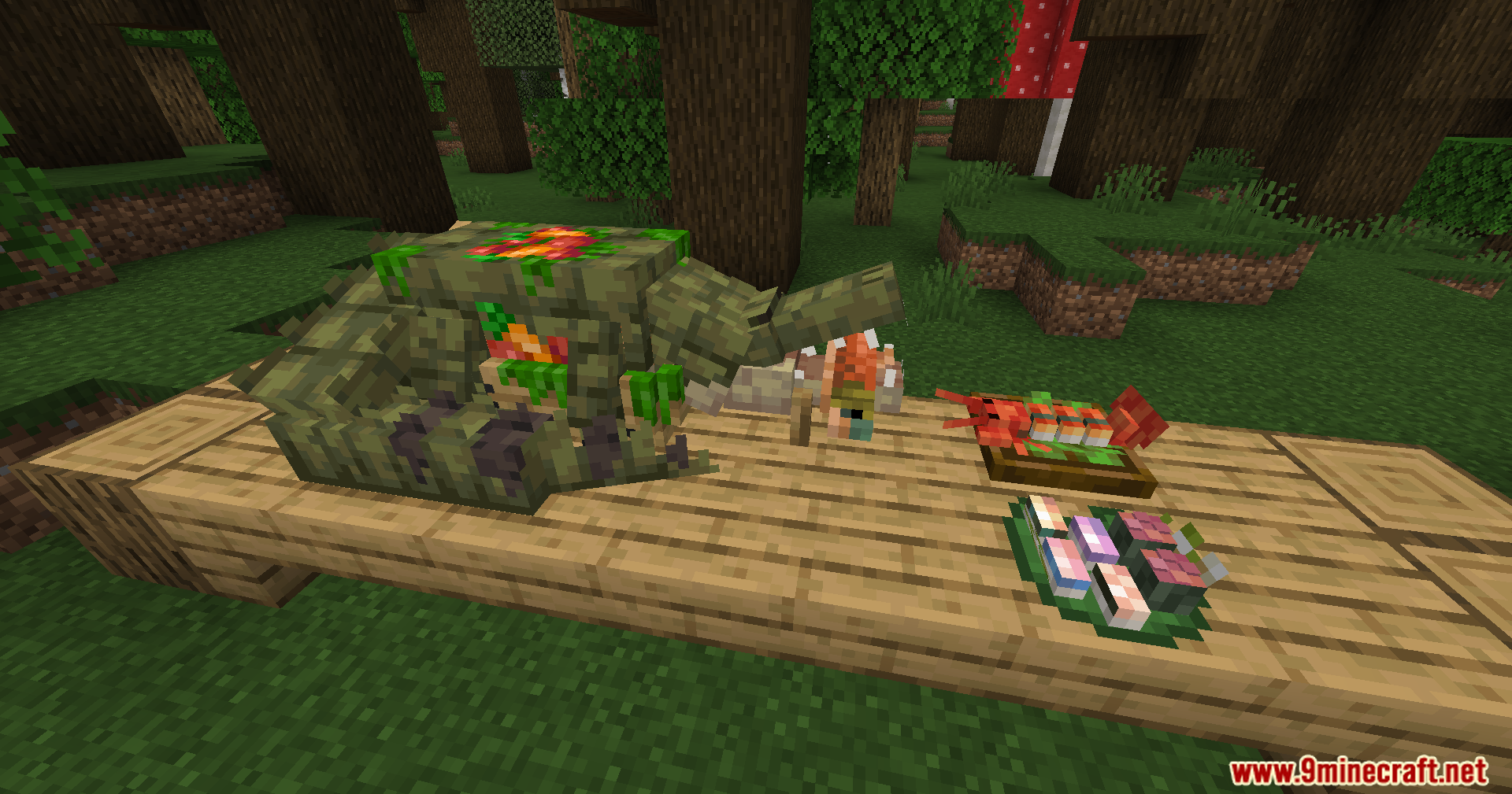 Alexs Mobs Delight Mod Screenshot 2 Various cooked meals and ingredients displayed on a wooden table