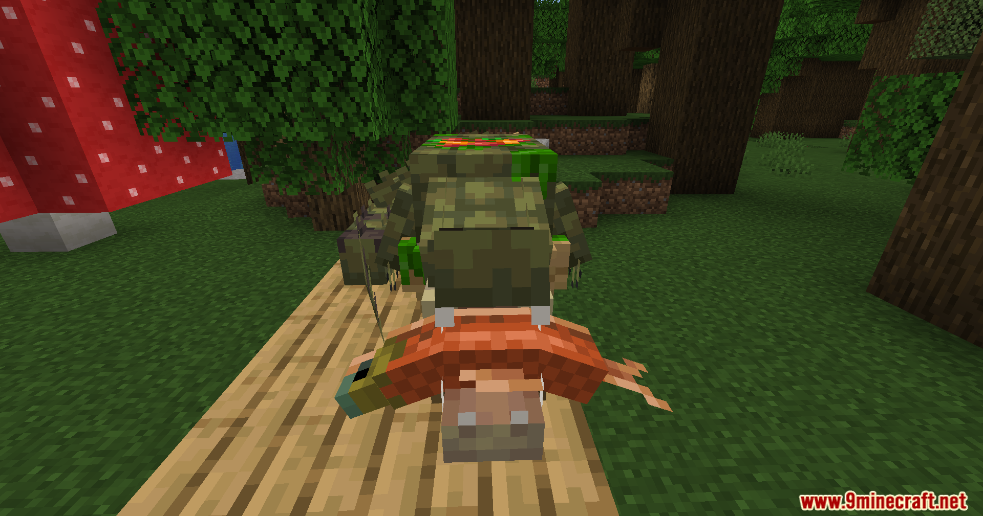 Alexs Mobs Delight Mod Screenshot 4 A crocodile eating a cooked lobster on a wooden table