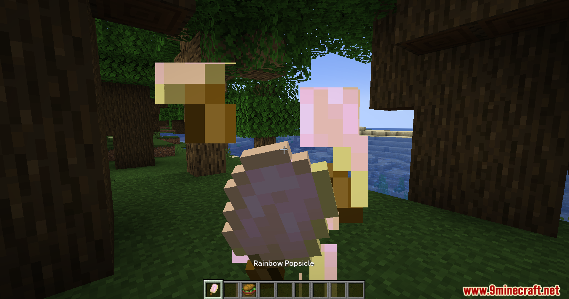 Alexs Mobs Delight Mod Screenshot 8 Holding a Rainbow Popsicle item in the game