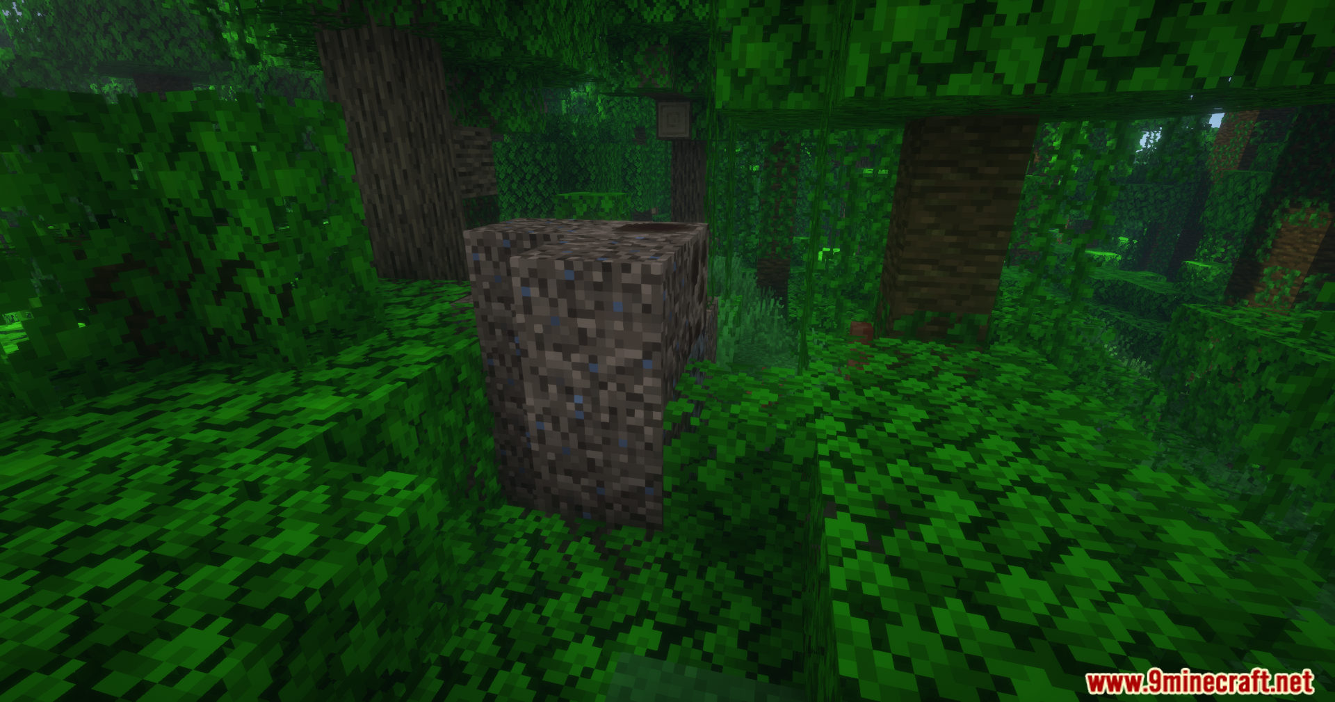 Alex's Mobs Unofficial Port Mod Screenshot 11 A block of dirt with blue specks in a jungle biome