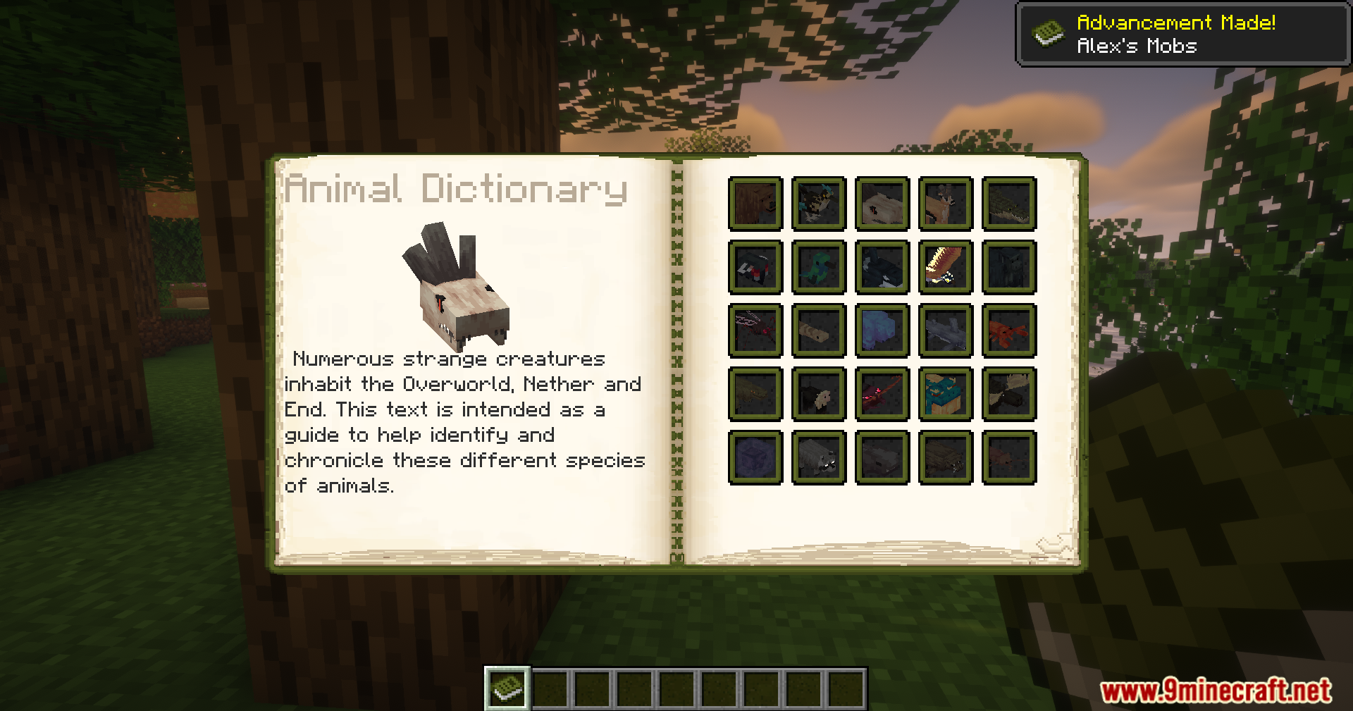 Alex's Mobs Unofficial Port Mod Screenshot 2 Animal Dictionary book opened showing creature icons and description text
