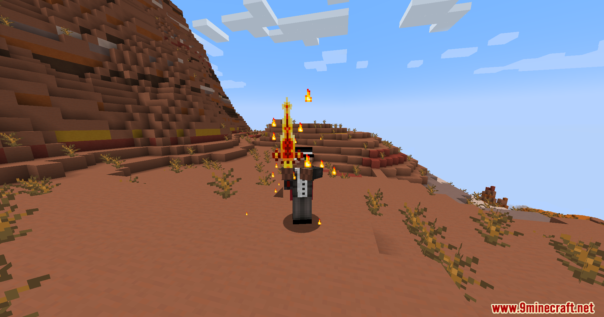 Player swinging a magical sword with fire particle effects