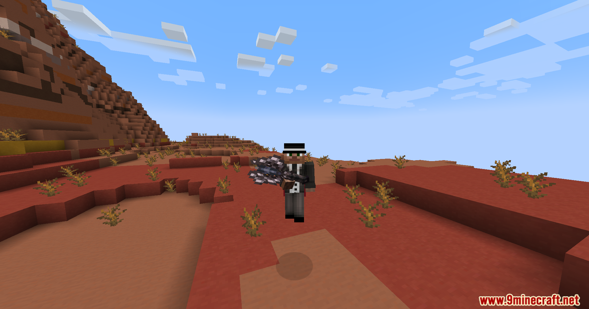 Player holding a spiky weapon in the badlands
