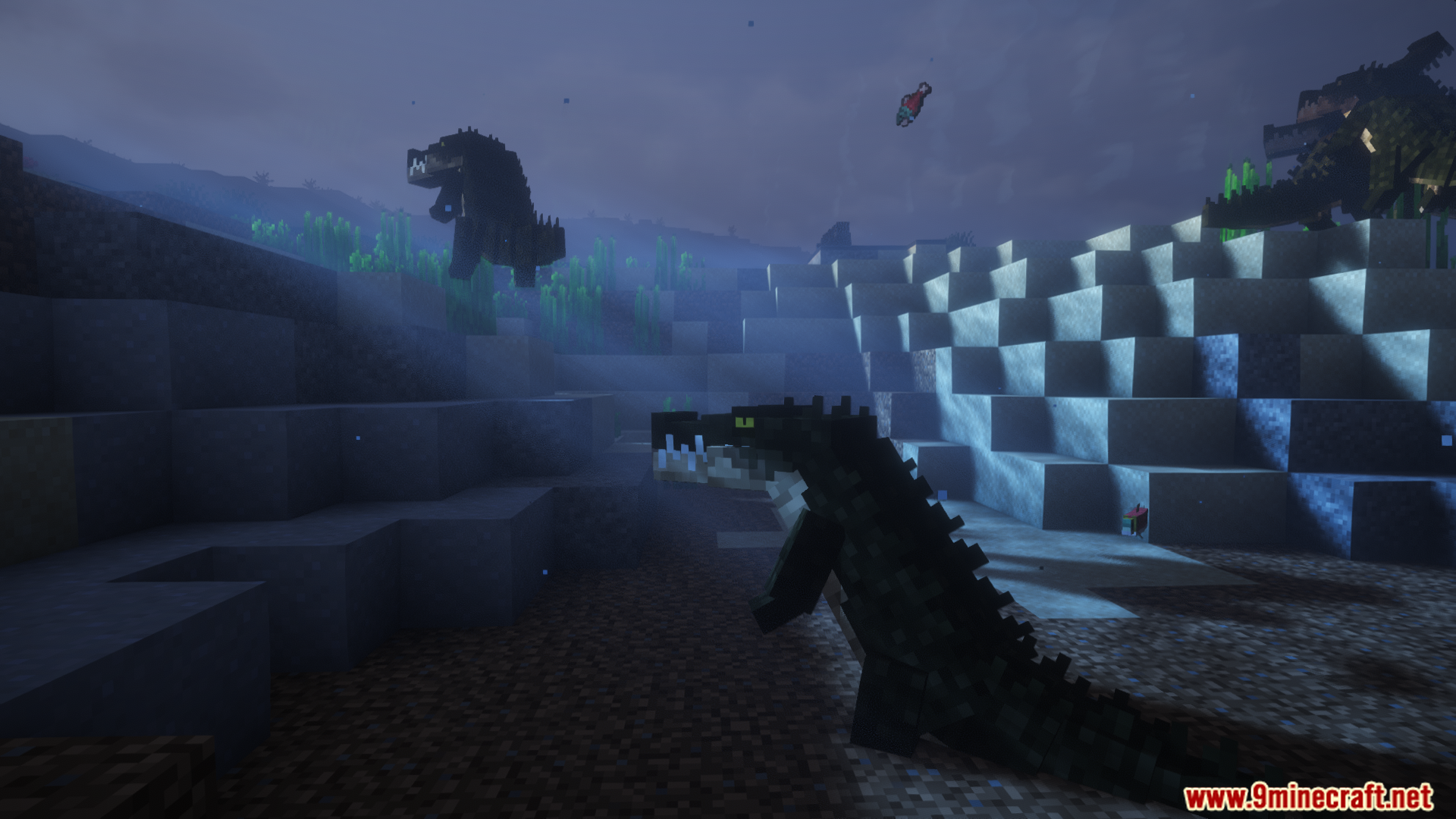 Multiple crocodiles gather on a dark, foggy shore