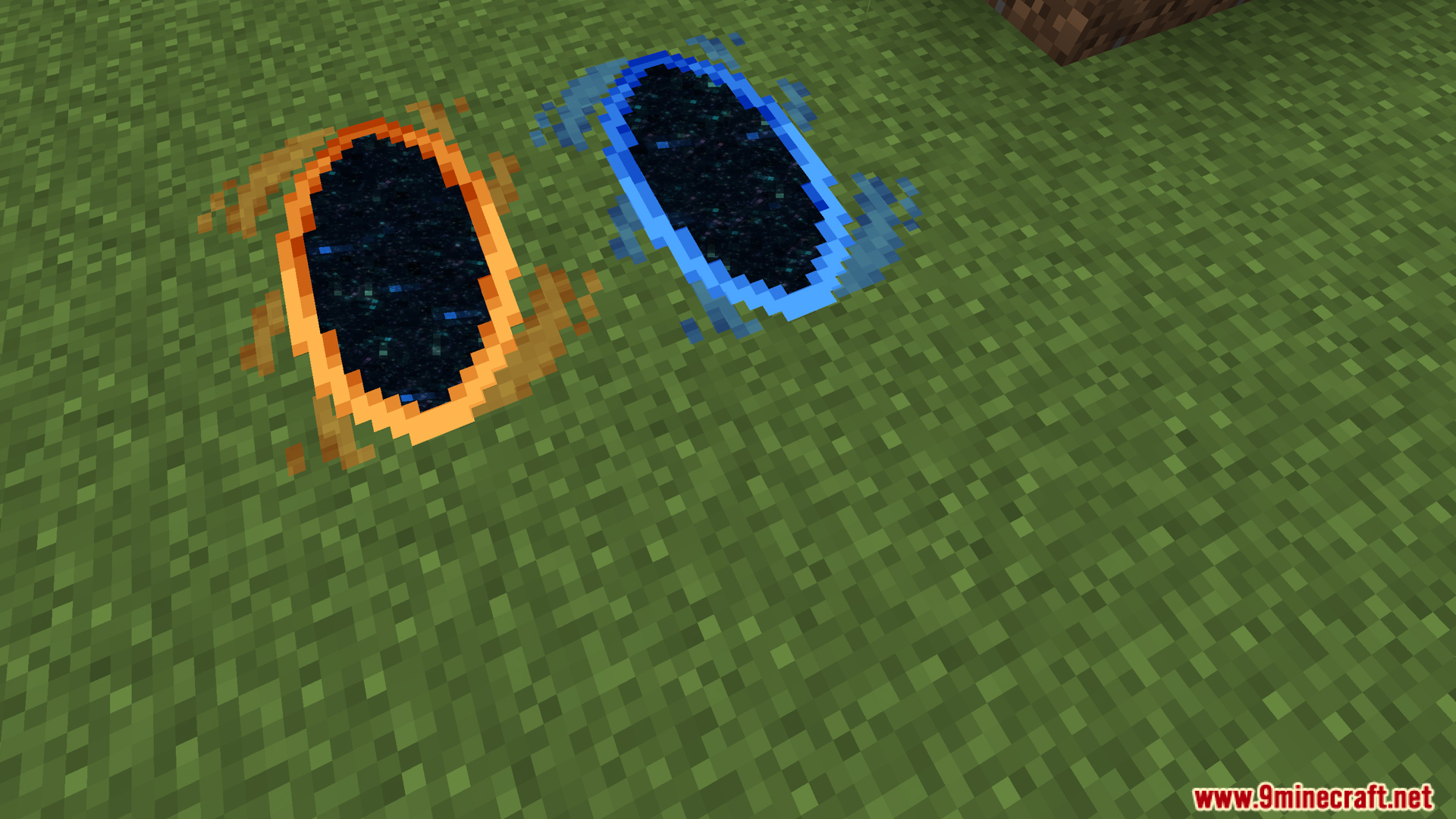 Orange and blue portals placed on a grassy field