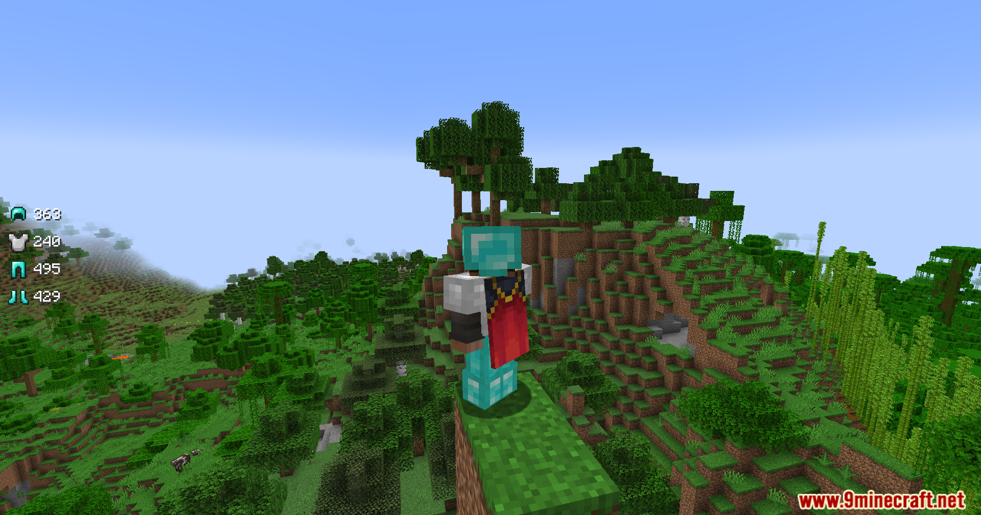 Armor Status Mod Screenshot 3 A Minecraft player wearing armor stands on a cliff overlooking a jungle biome