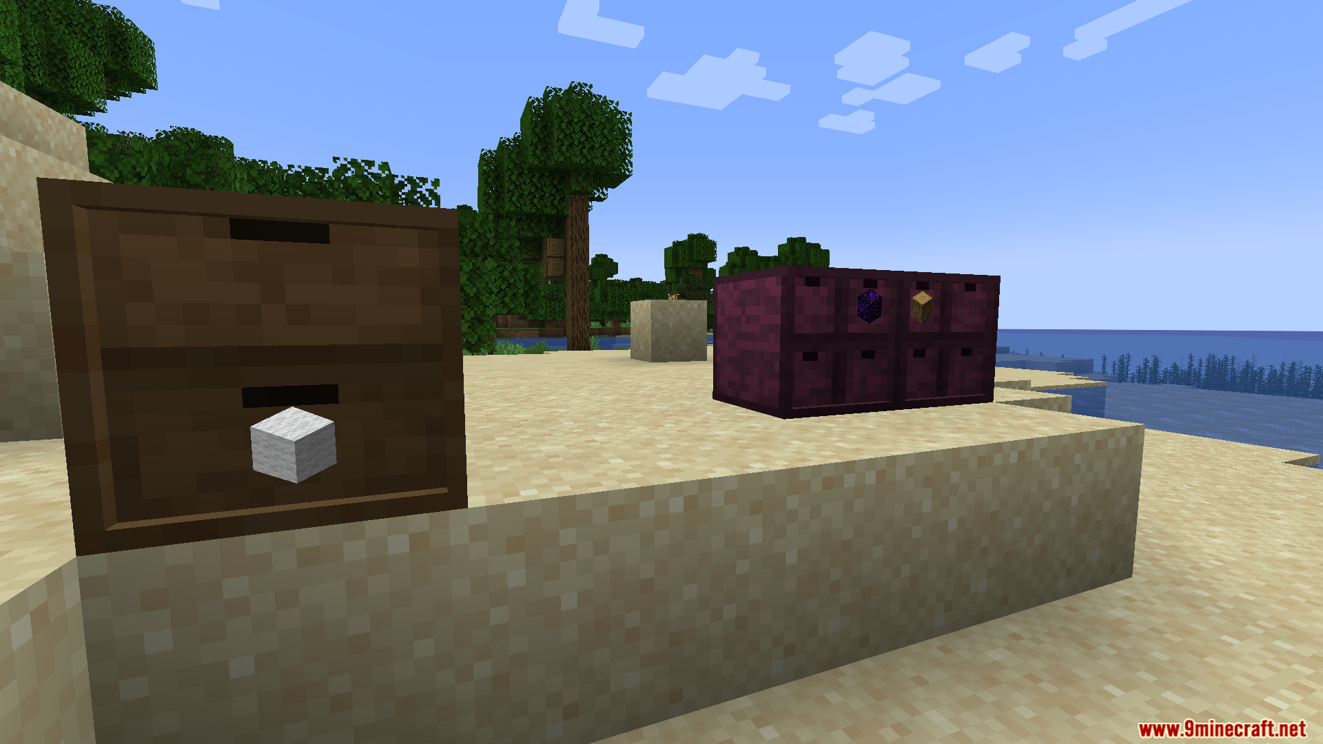 BBL Fixes Mod Screenshot 15 Storage drawers blocks displaying items on a sandy beach in Minecraft