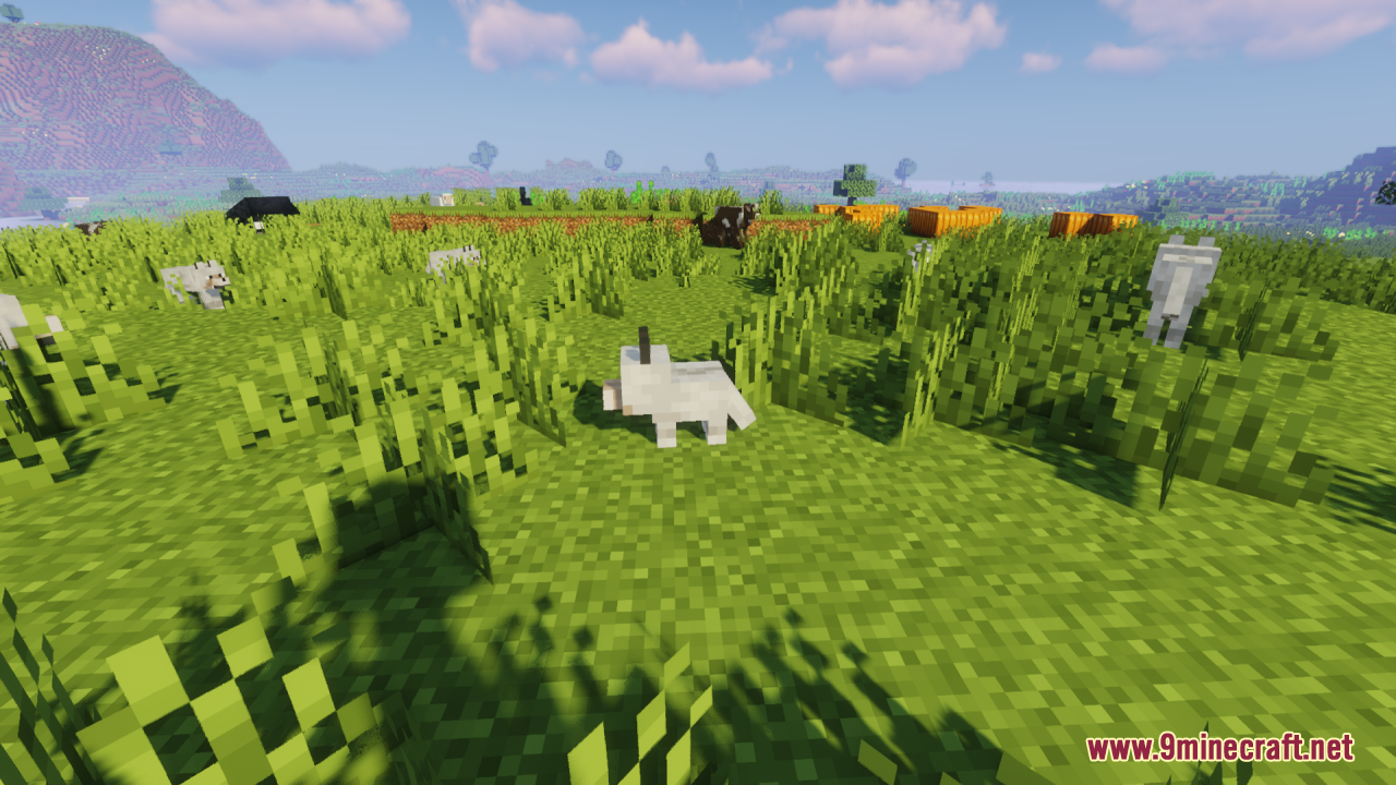 Baby Mobs Resource Pack Screenshot 10 Tiny baby wolf mob facing right in a bright green Minecraft meadow