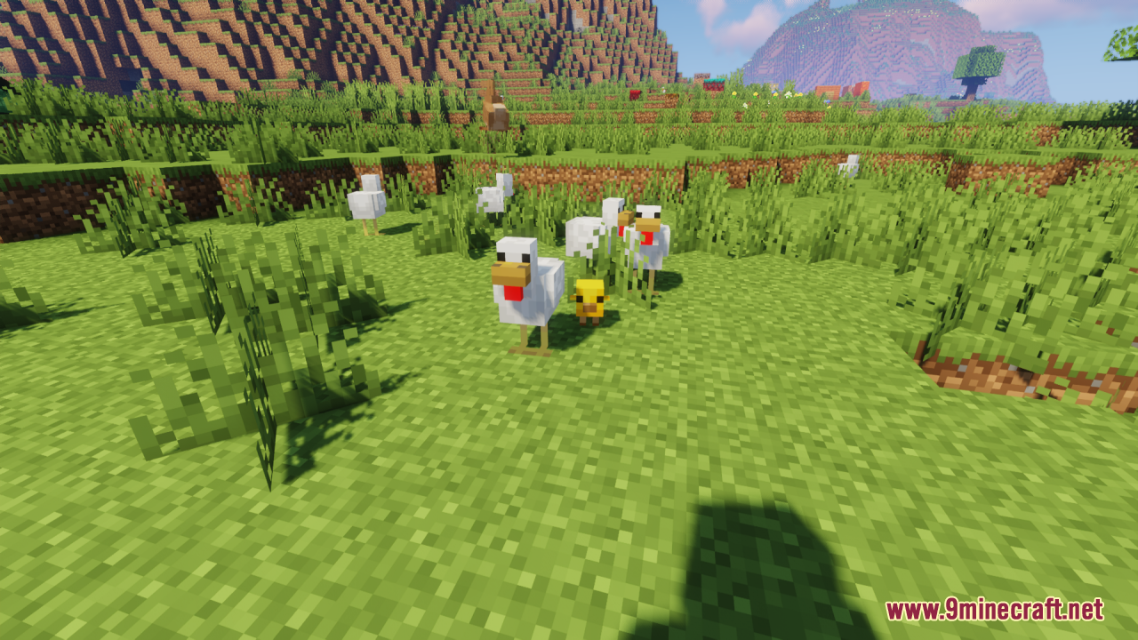 Baby Mobs Resource Pack Screenshot 2 A yellow baby chicken follows an adult chicken through a grassy Minecraft landscape