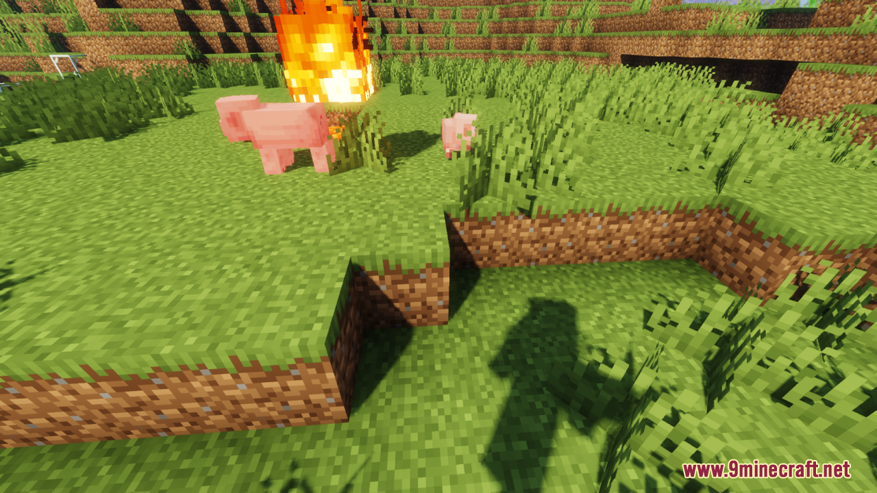Baby Mobs Resource Pack Screenshot 6 Adult pig and baby pig standing near a fire on grass blocks