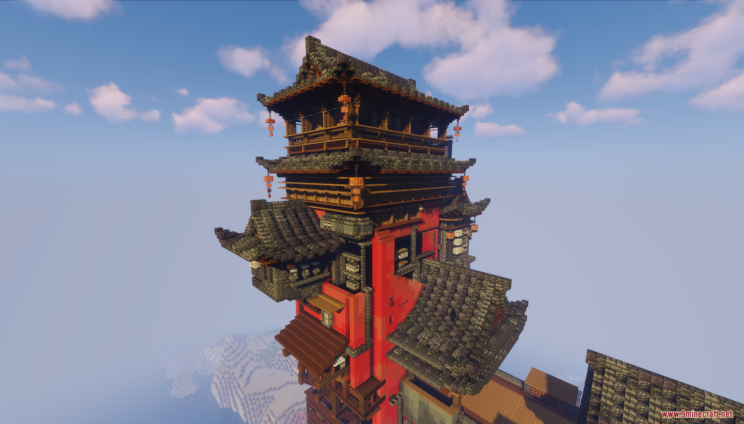 Detailed view of traditional roofs and lanterns on the tower