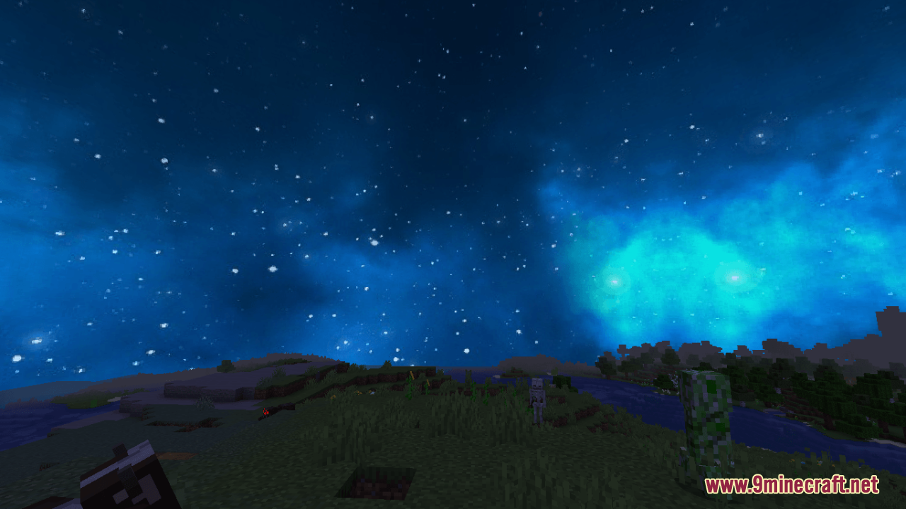 Custom starry night sky featuring a bright blue nebula over a dark landscape