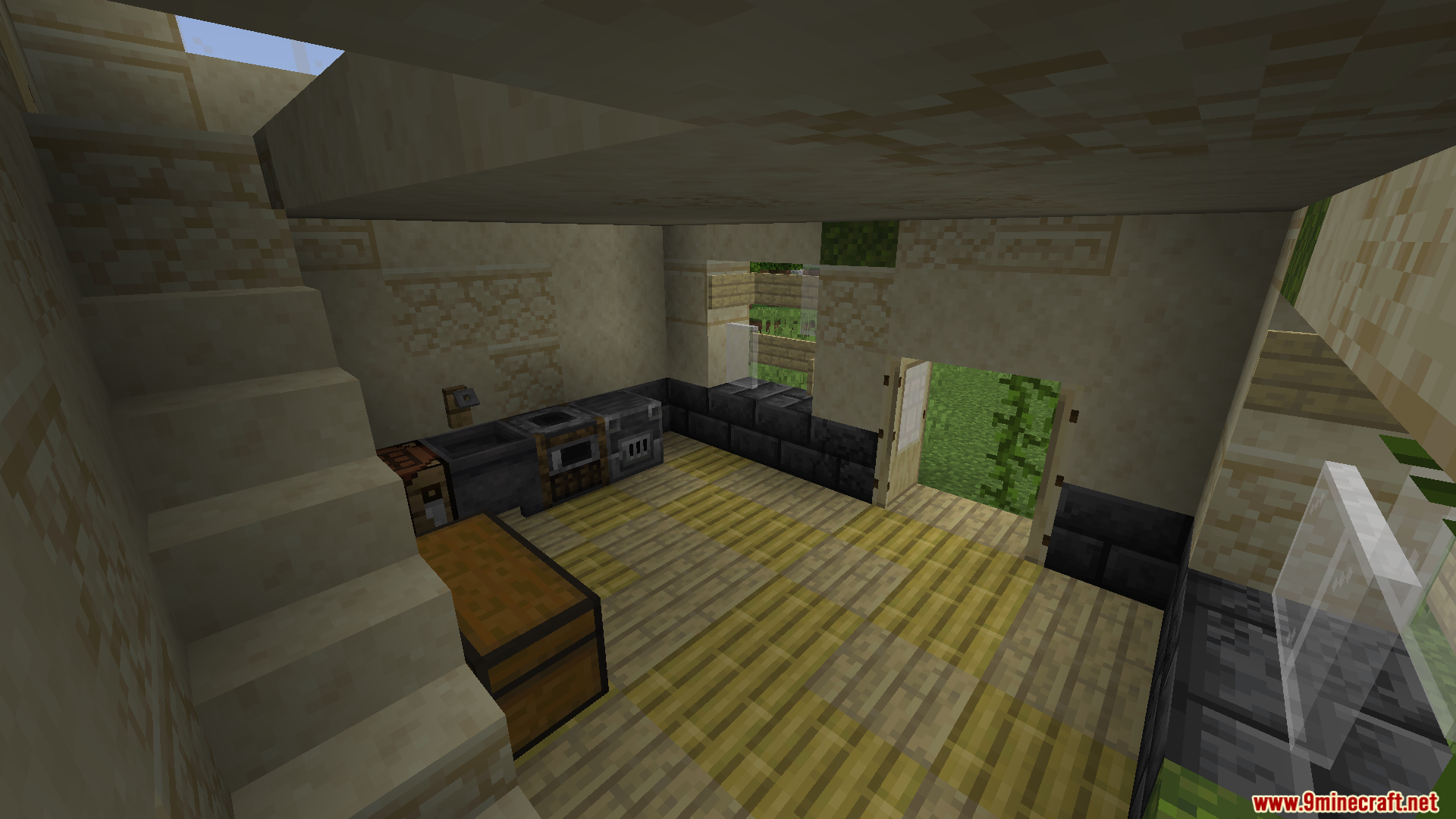 A small kitchen and staircase inside a sandstone house
