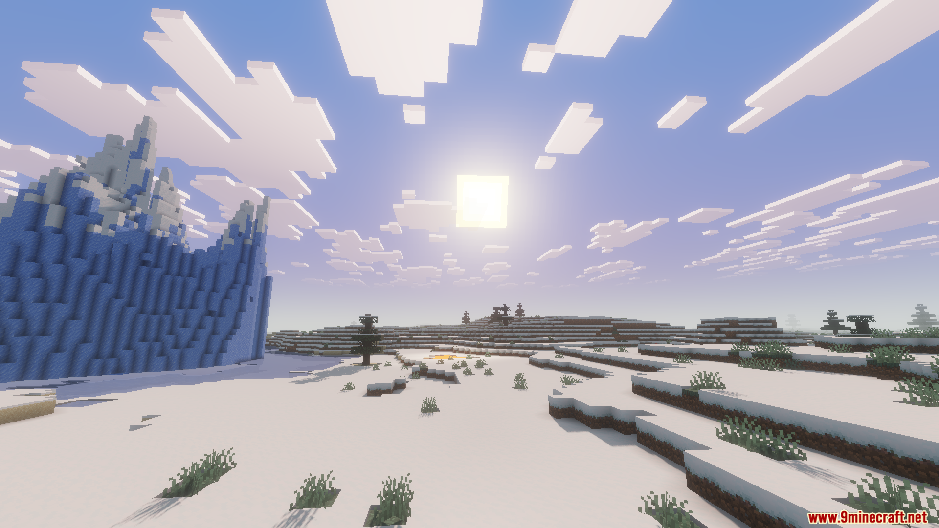 Beryl Mod Screenshot 5 Snowy Minecraft landscape featuring tall ice spikes and enhanced bright sun lighting