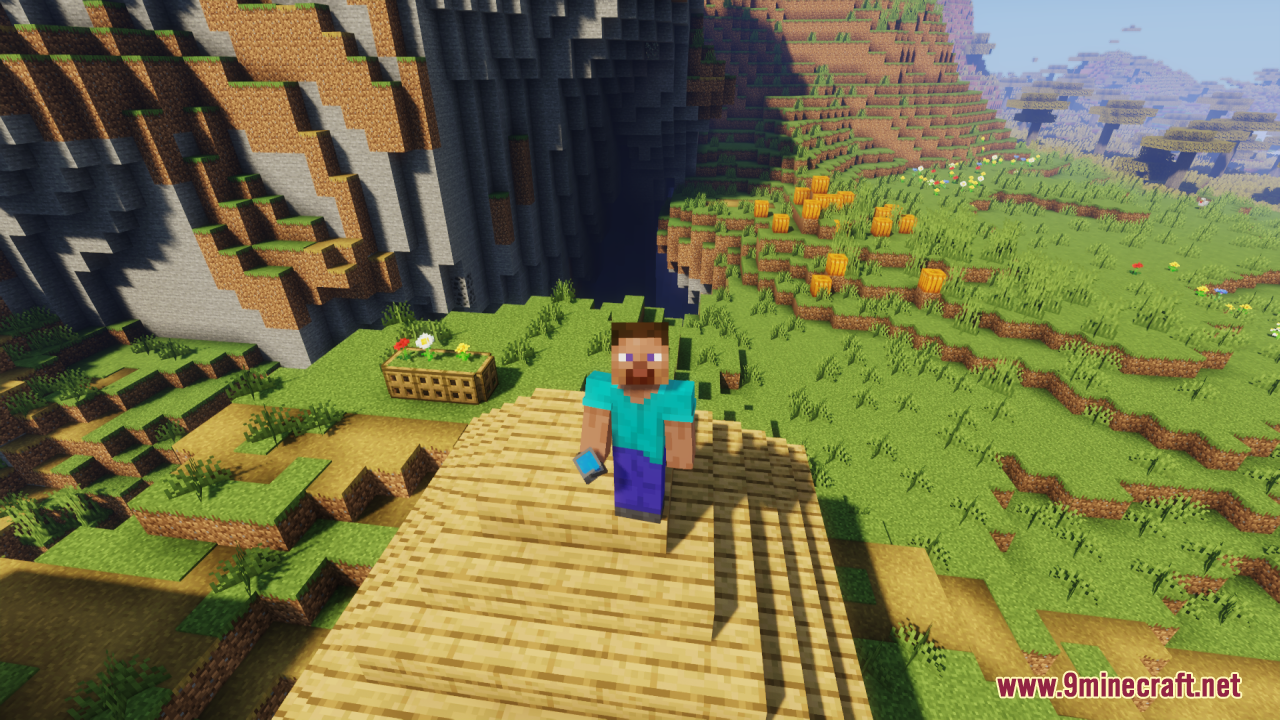Better Bucket 3D Resource Pack Screenshot 3 Minecraft player holding a 3D water bucket in a grassy landscape