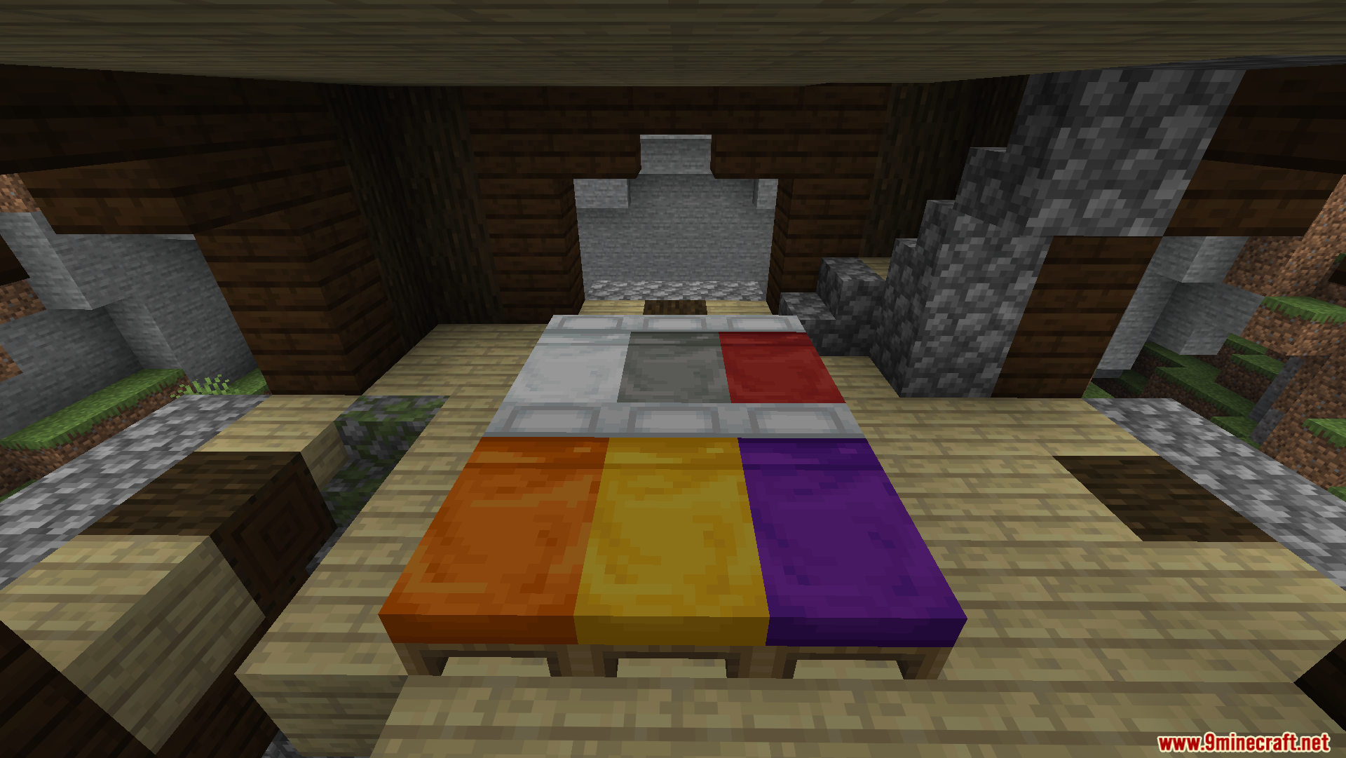 A large bed made of six different colored beds