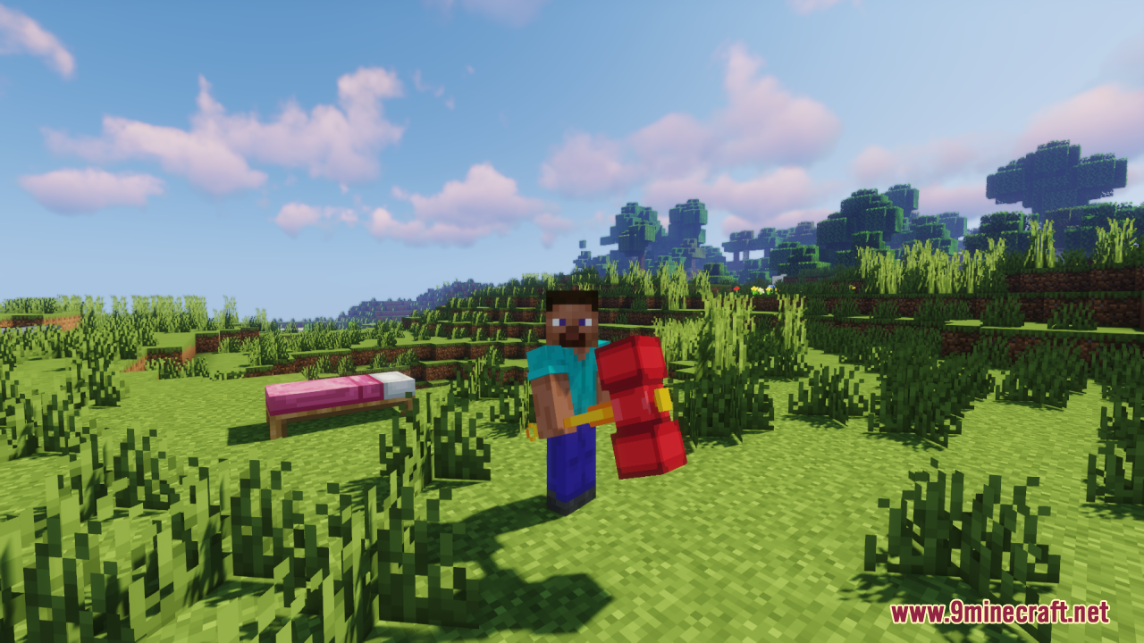 Player holding the custom red and yellow hammer in a grassy landscape