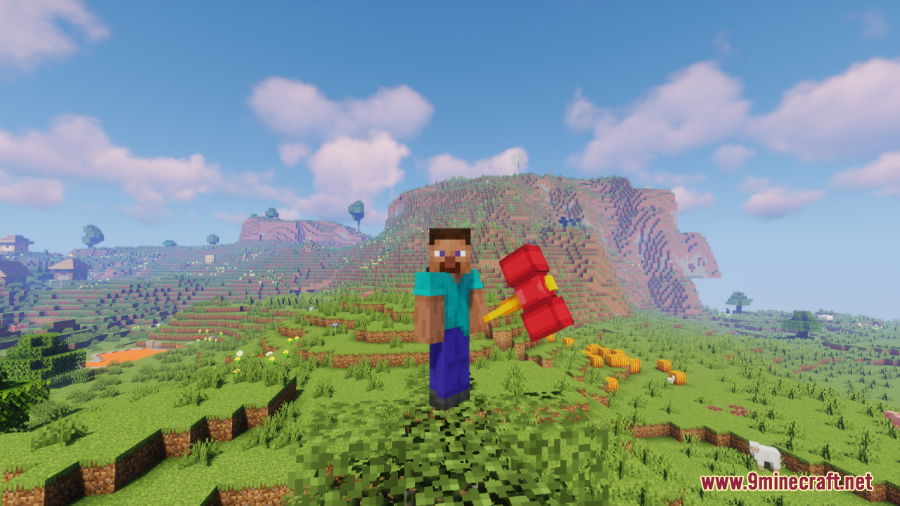Steve character holding the custom red and yellow hammer in a grassy field