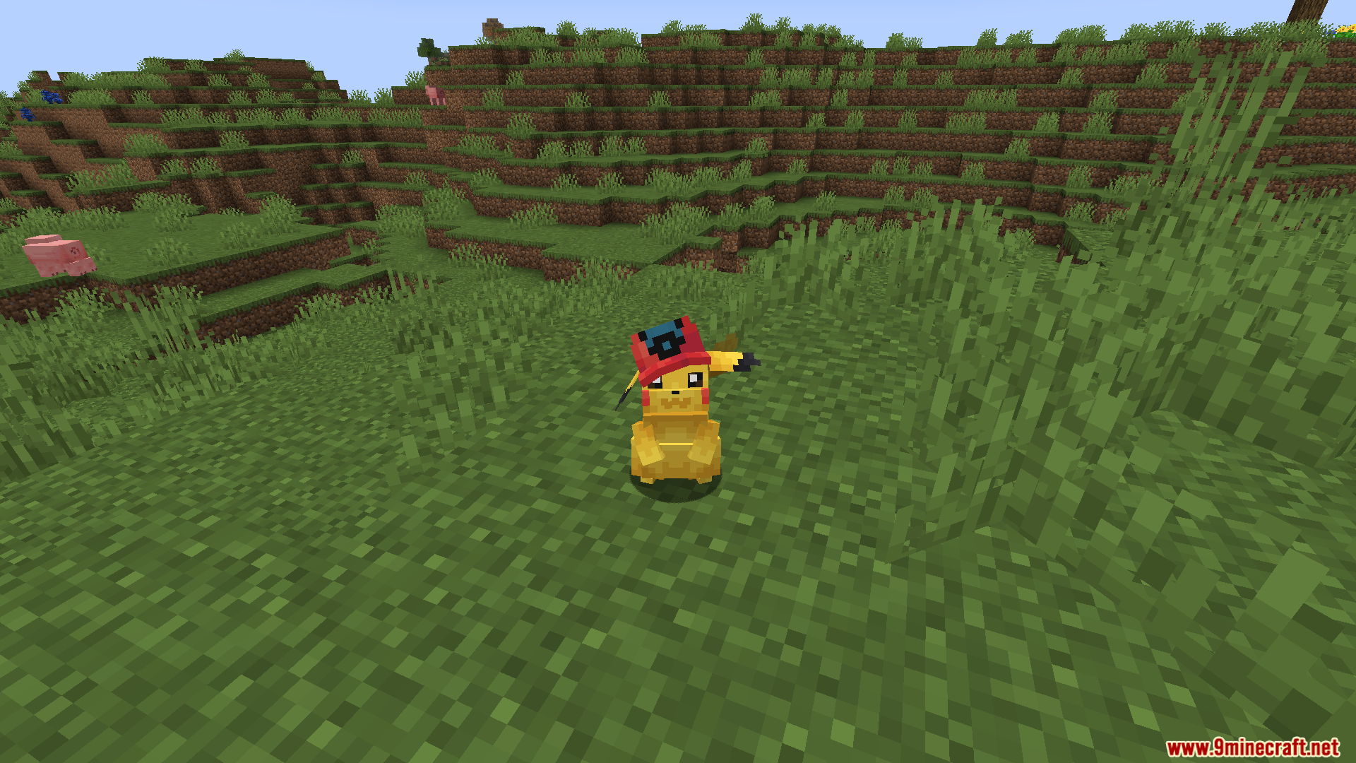 A Pikachu wearing a red and white cap in a grassy field