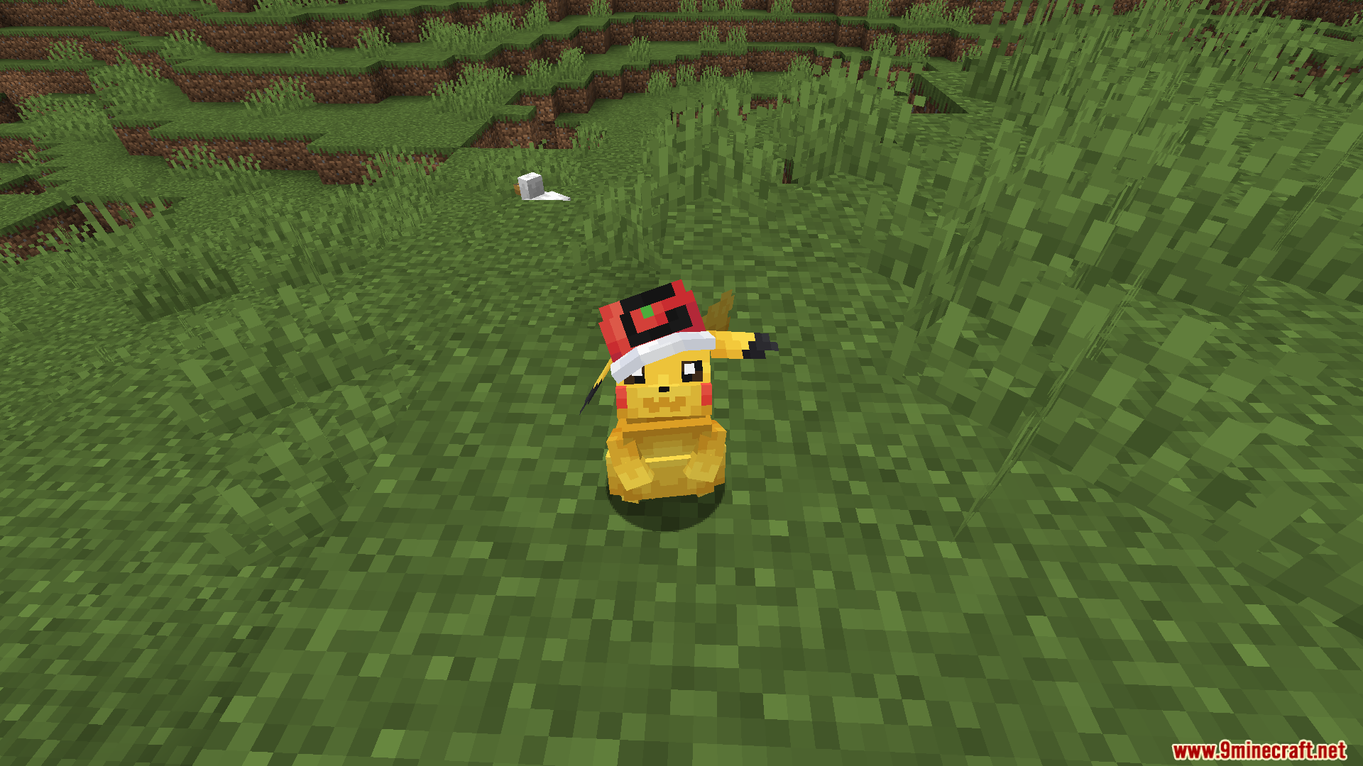 A Pikachu wearing the Original Cap in a grassy field