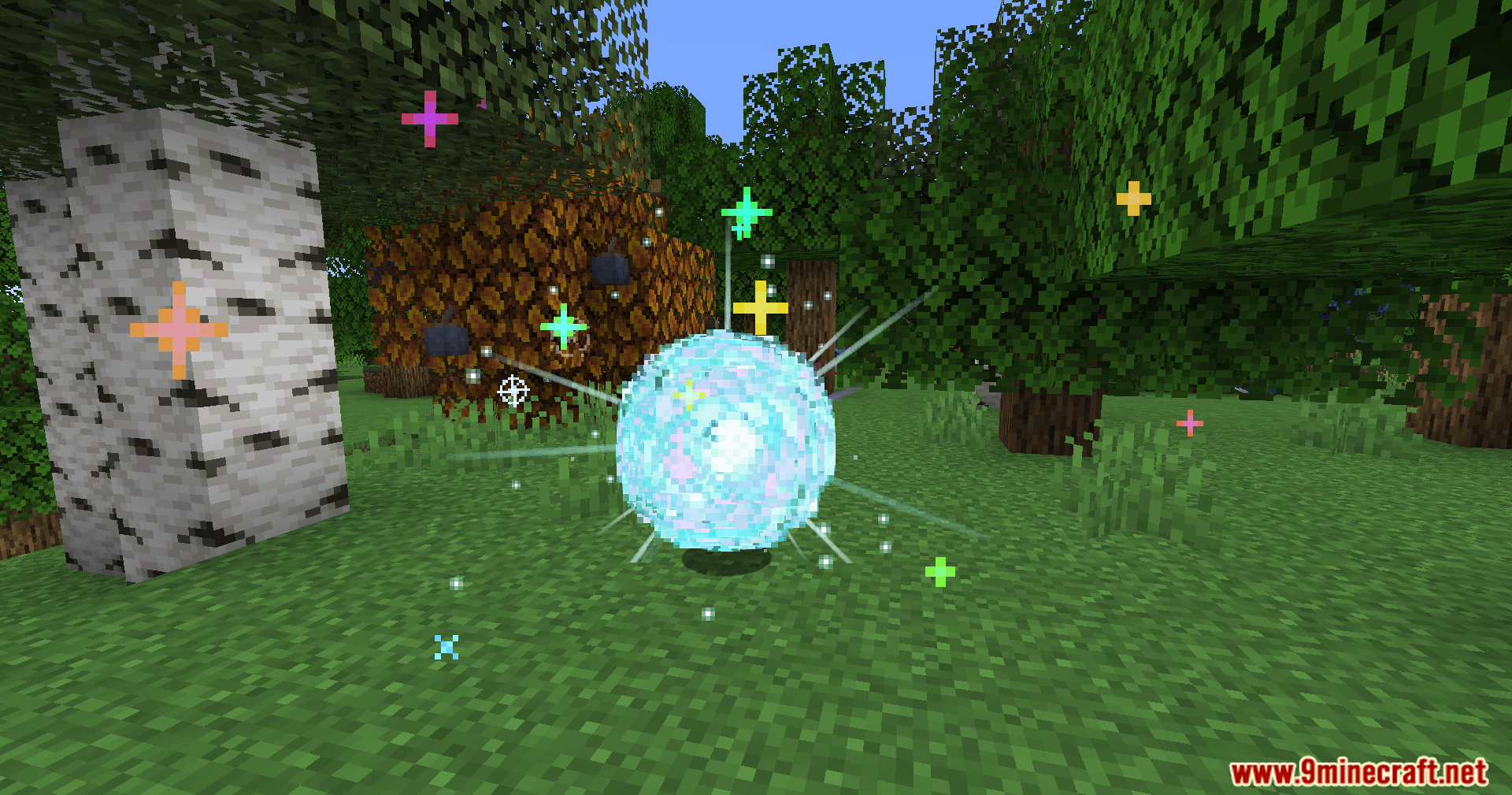 Cobblemon CRZ Moves Pokemon Mod Screenshot 10 A glowing blue sphere emitting colorful cross-shaped particles in a forest