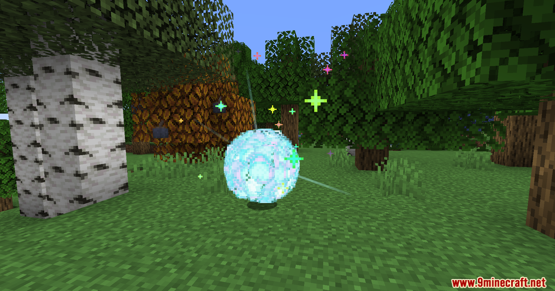 Cobblemon CRZ Moves Pokemon Mod Screenshot 12 Bright floating energy orb surrounded by colorful sparkles in a grassy area