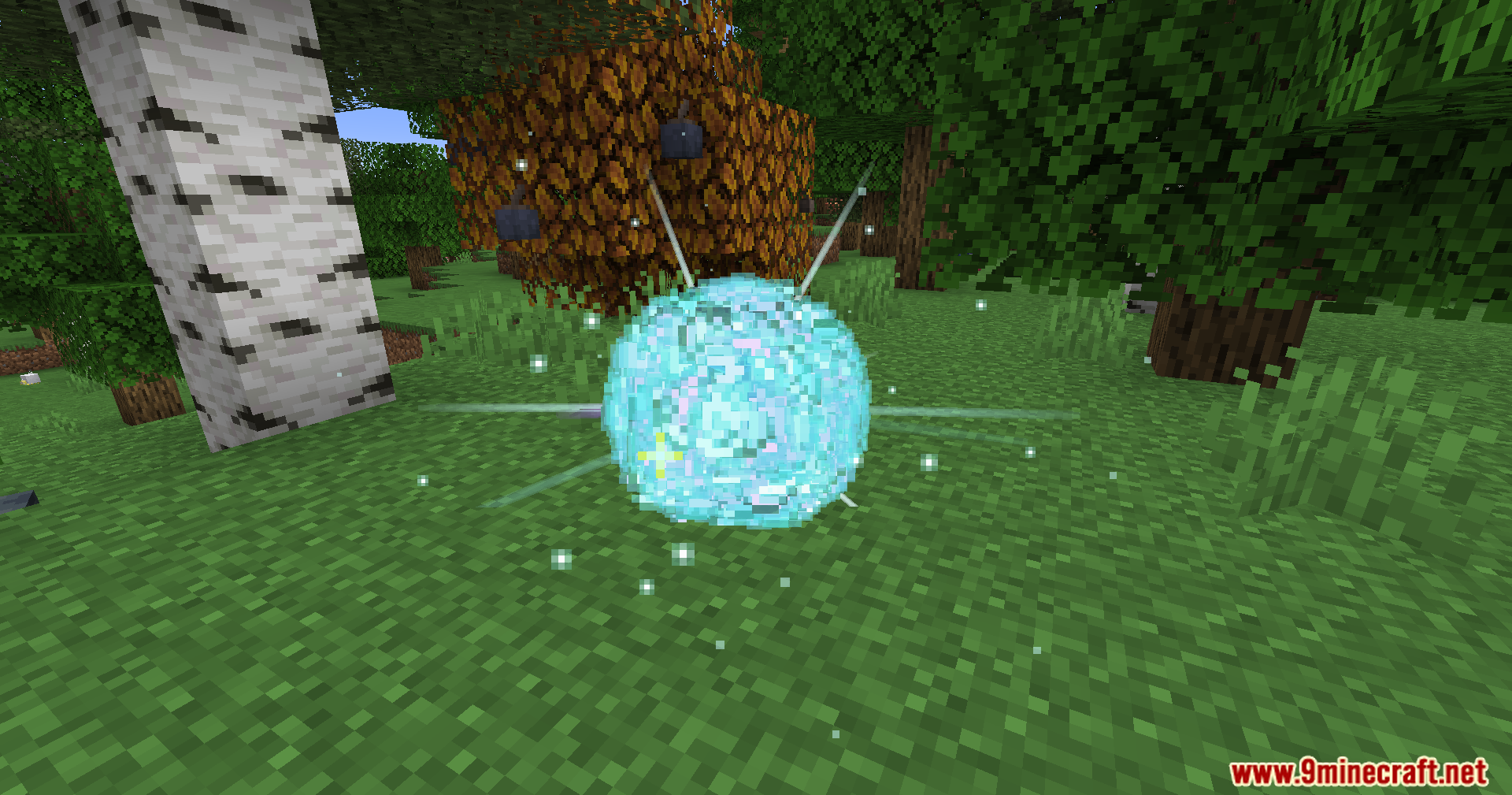 Cobblemon CRZ Moves Pokemon Mod Screenshot 9 A glowing blue sphere surrounded by small white sparkles in a forest
