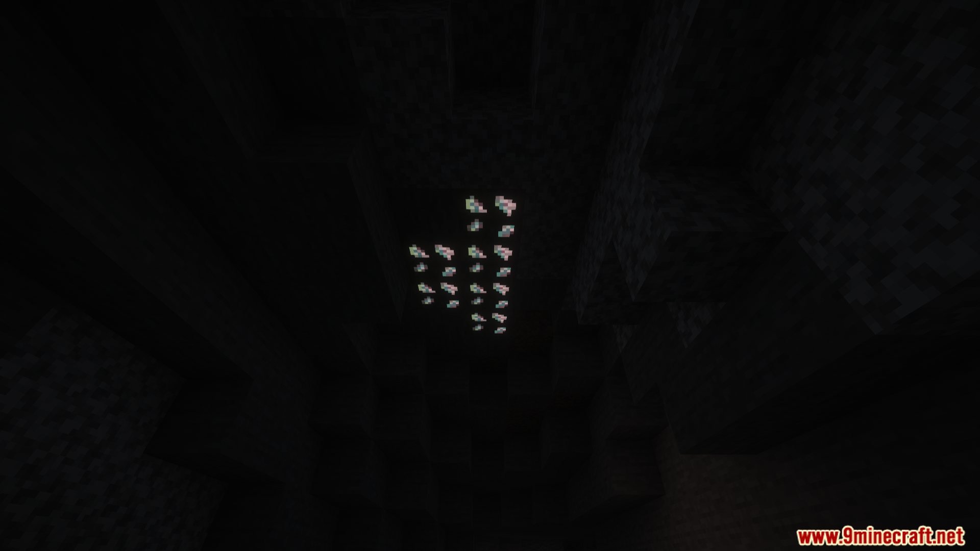 A vein of glowing ores on a high cave ceiling