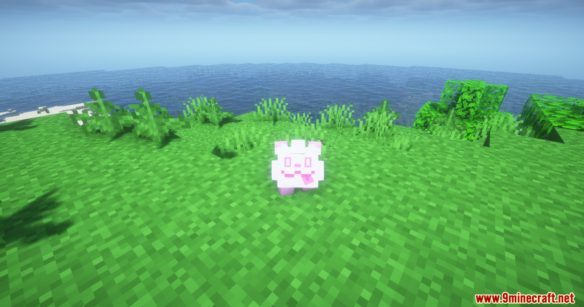 Small white blocky Swirlix creature standing on green grass near the ocean
