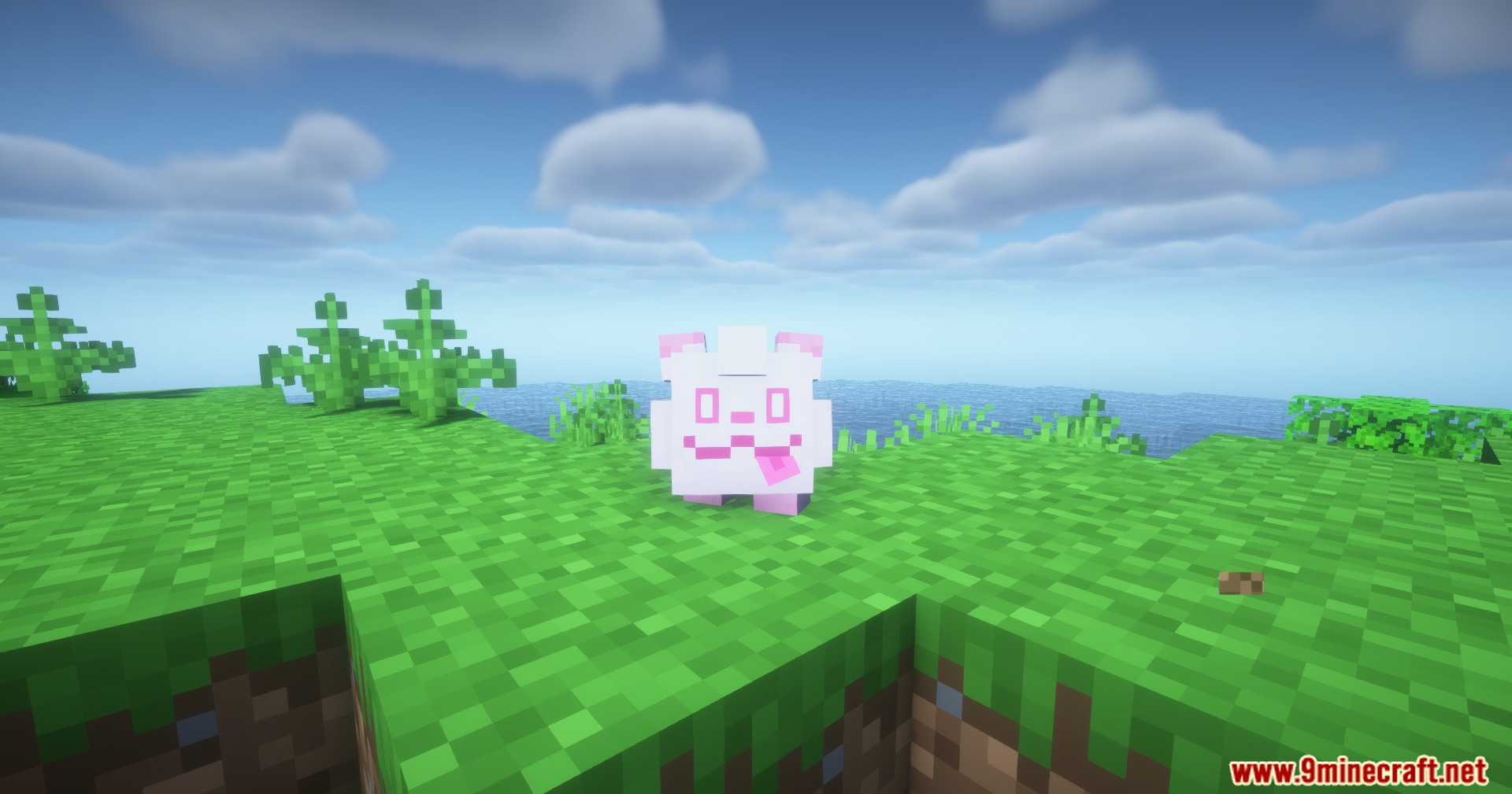 A small white and pink creature standing on a grassy block in a Minecraft world