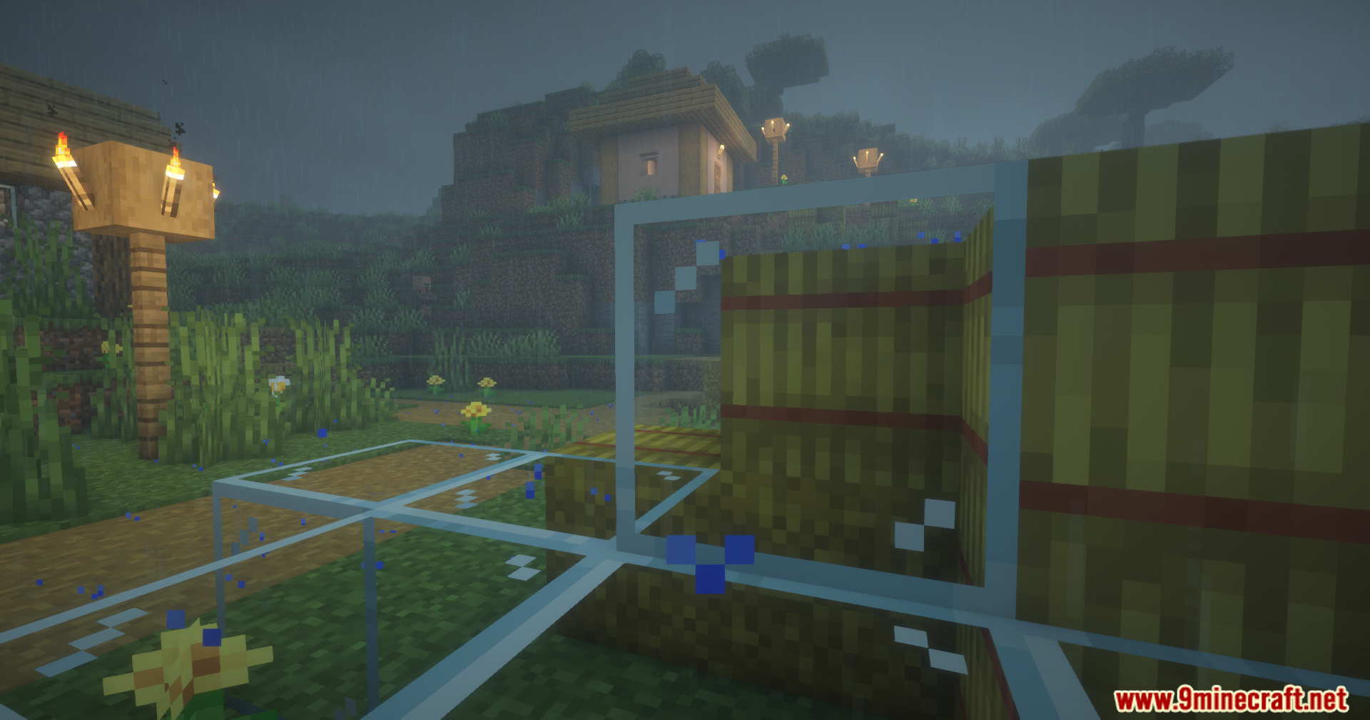Cool Rain Reforged Mod Screenshot 5 Rain falling on glass blocks next to hay bales in a village