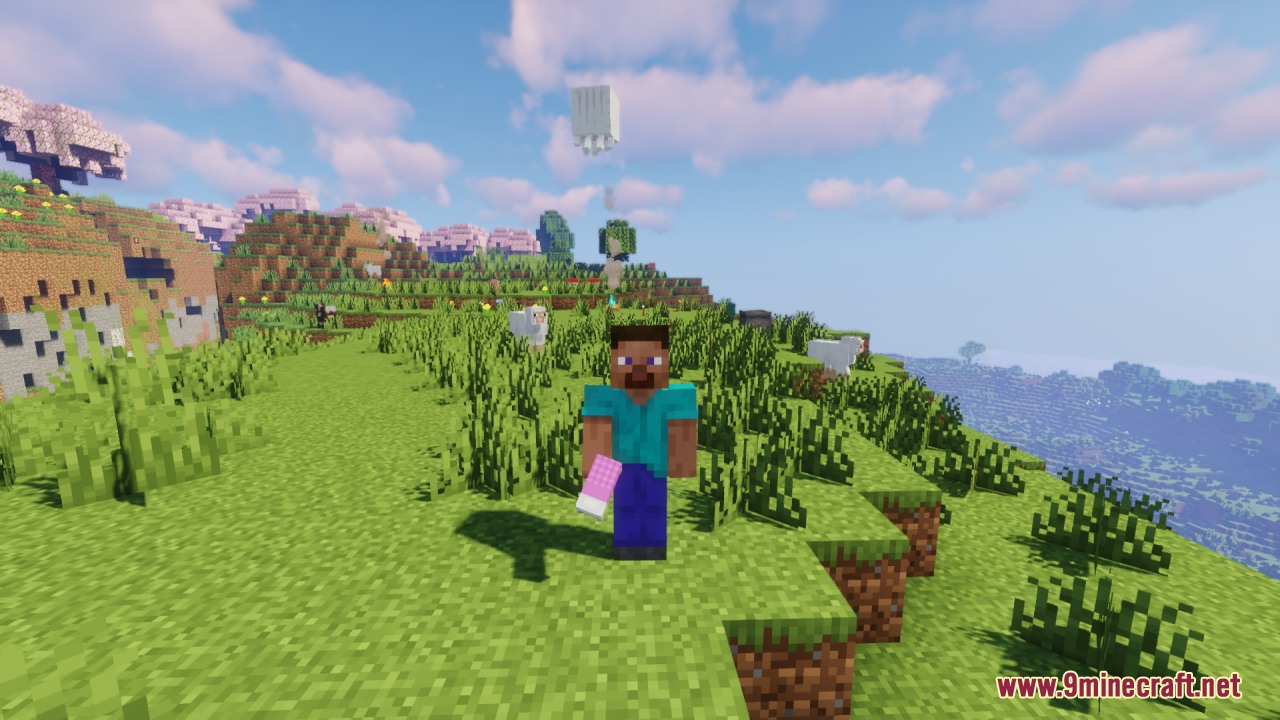 Cozy Nook Beds Resource Pack Screenshot 11 Player holding a pink plaid blanket bed item in a grassy landscape