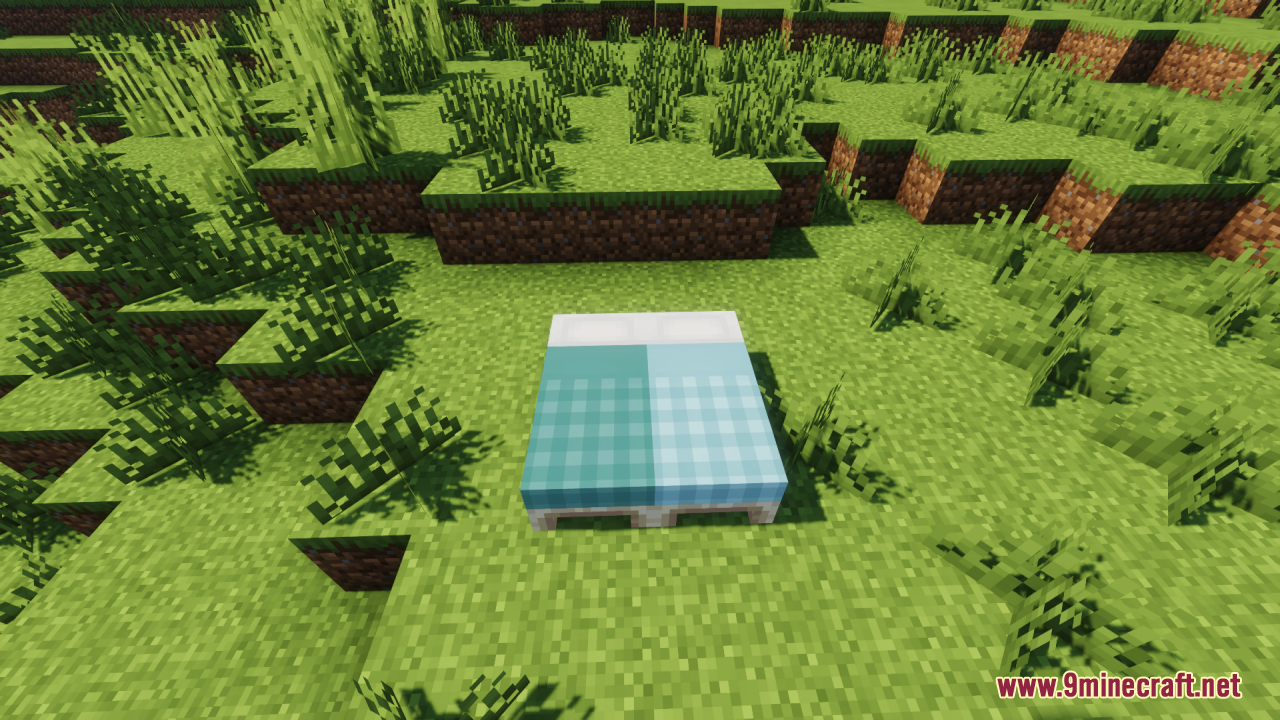 Cozy Nook Beds Resource Pack Screenshot 3 Two Minecraft beds with plaid patterned blankets placed on grass