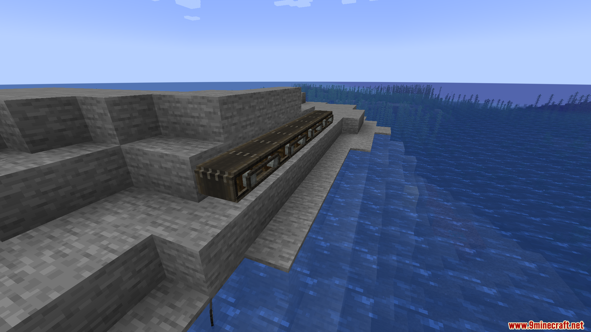 Create Transmission Mod Screenshot 11 A long transmission chain block placed on stone blocks near water