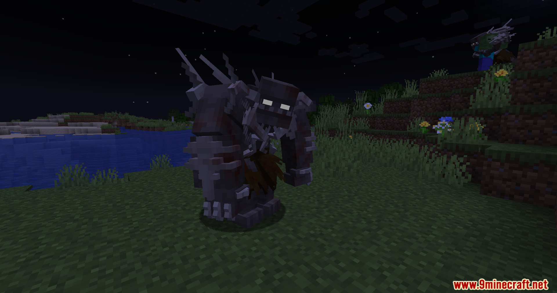 Large custom zombie creature standing in a grassy area at night