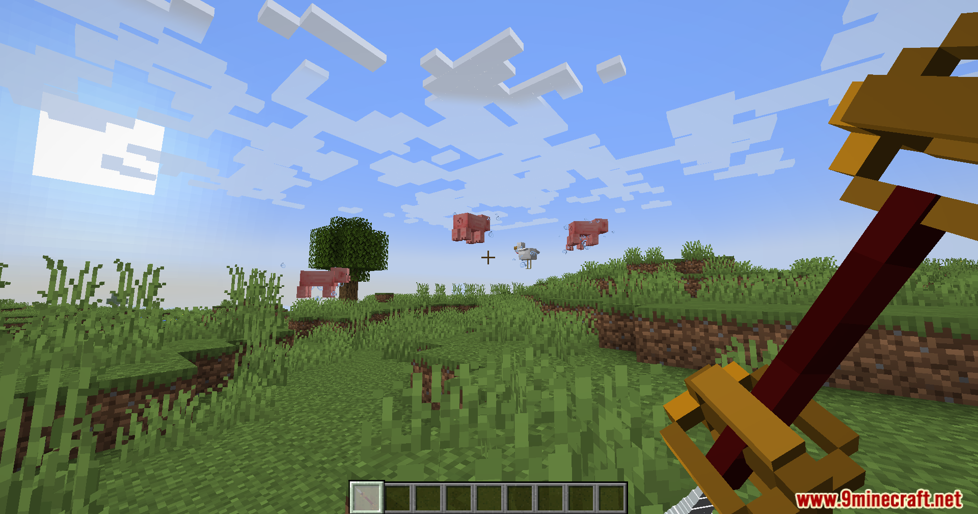 Player holding a custom weapon aiming at pigs
