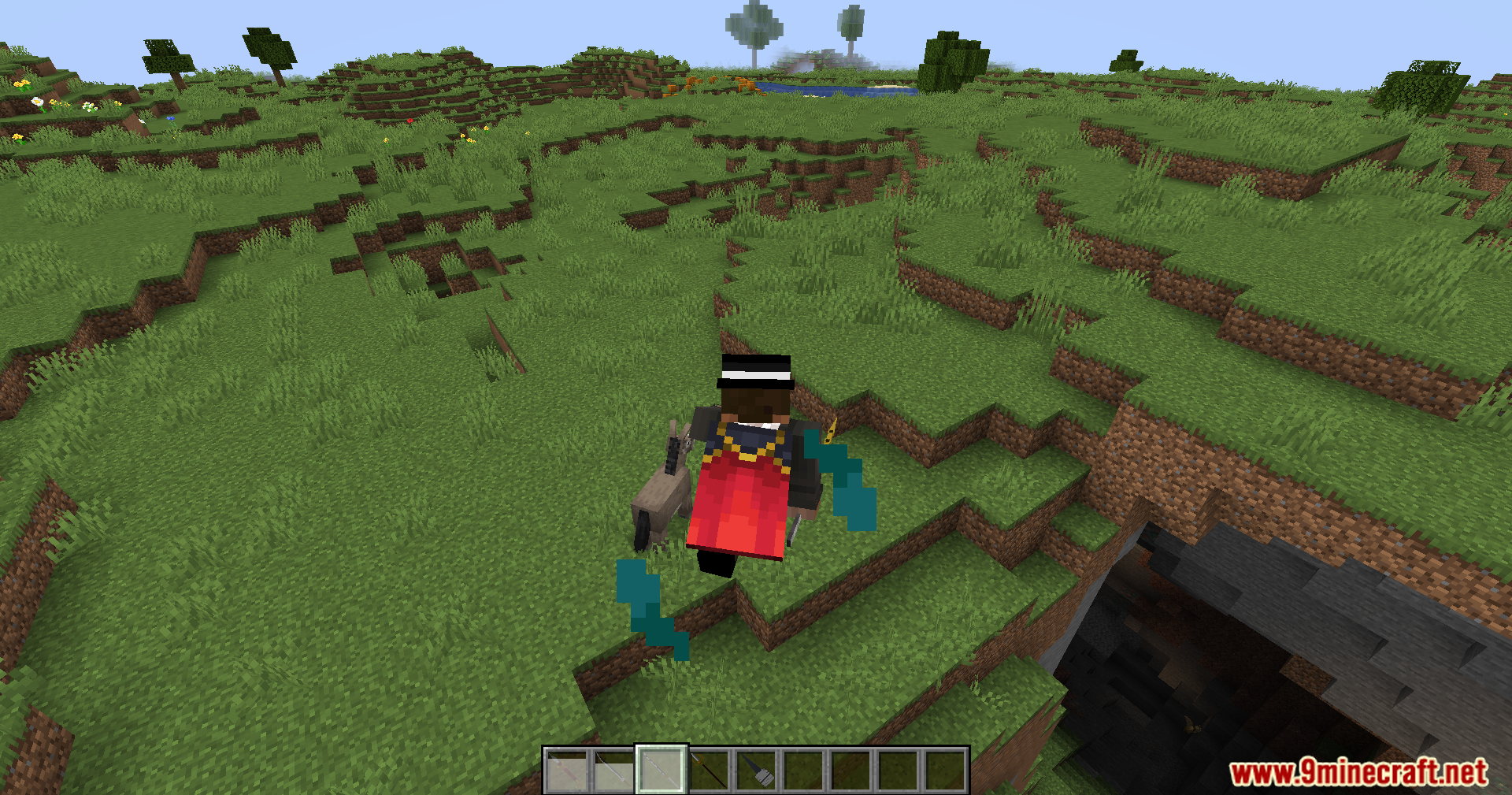 Player character with a red cape and dual glowing weapons