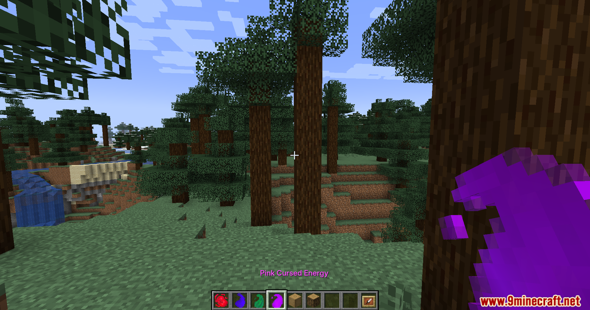 Player holding pink cursed energy in a spruce forest biome