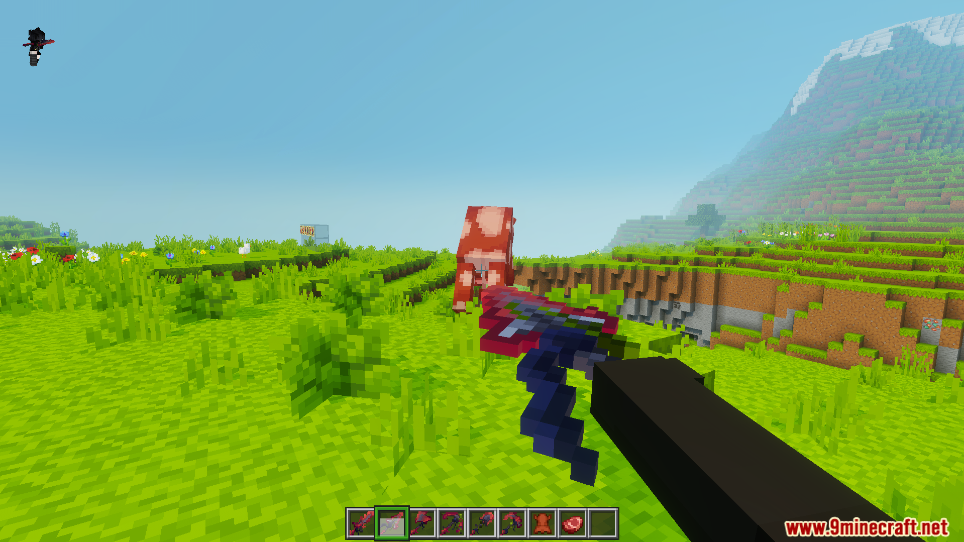 Player holding a custom red and blue sword aiming at a cow