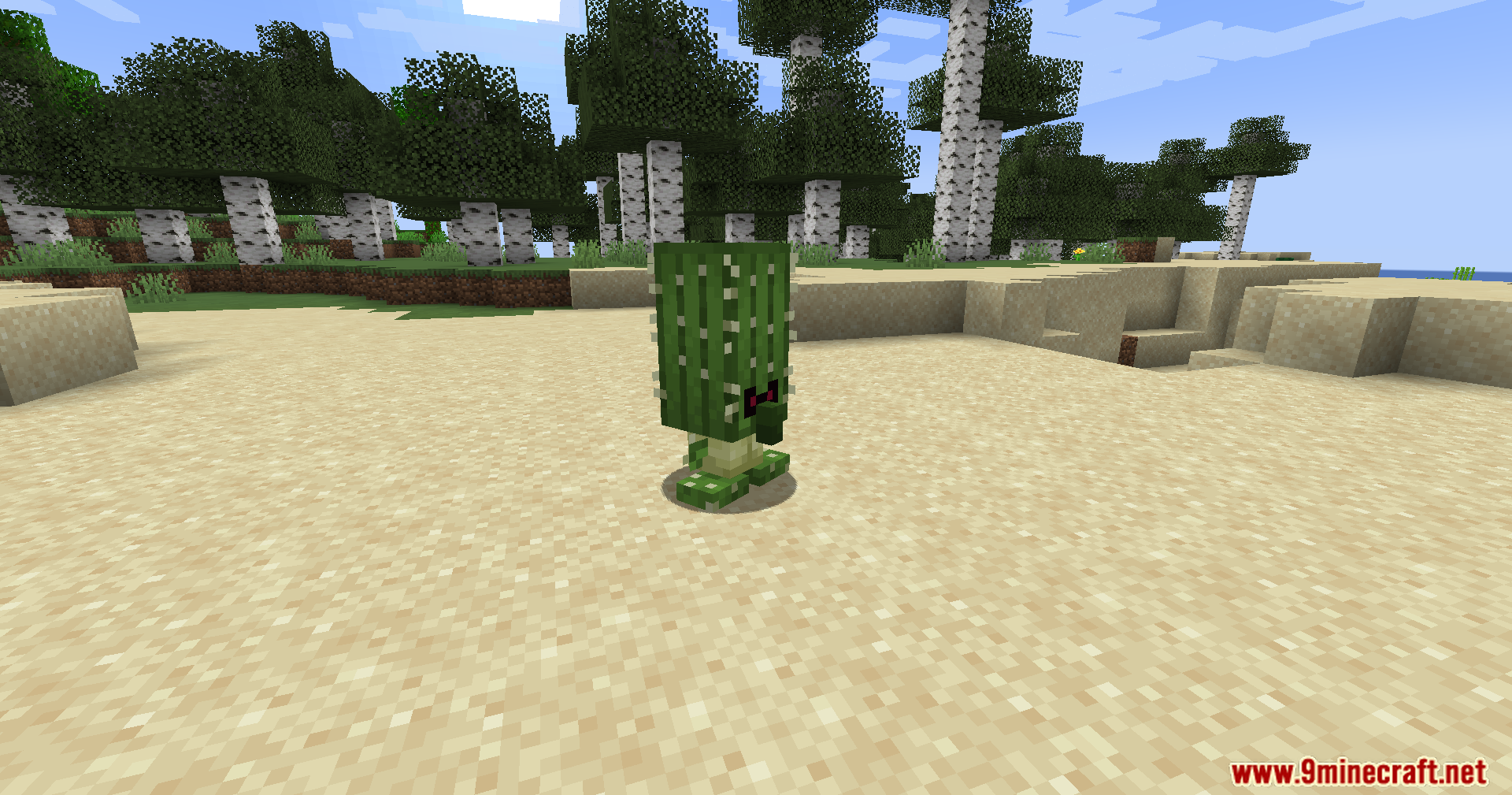 A small cactus golem stands on a sandy beach