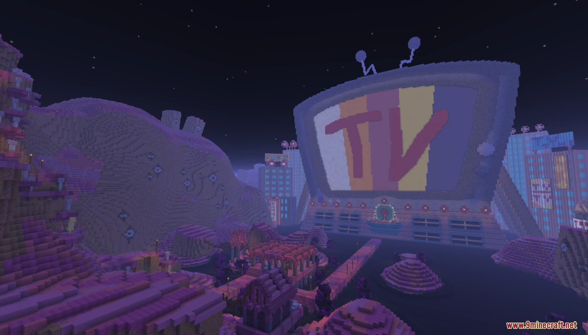 A giant television building looms over a dark, futuristic city
