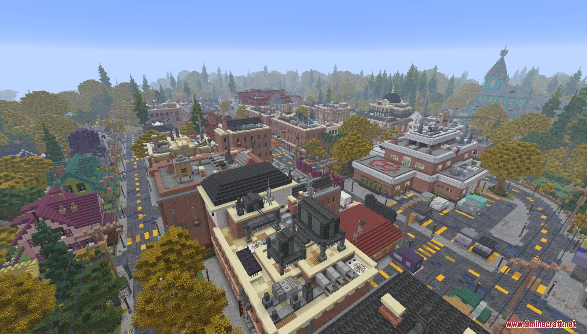 An aerial view of a detailed suburban town in autumn