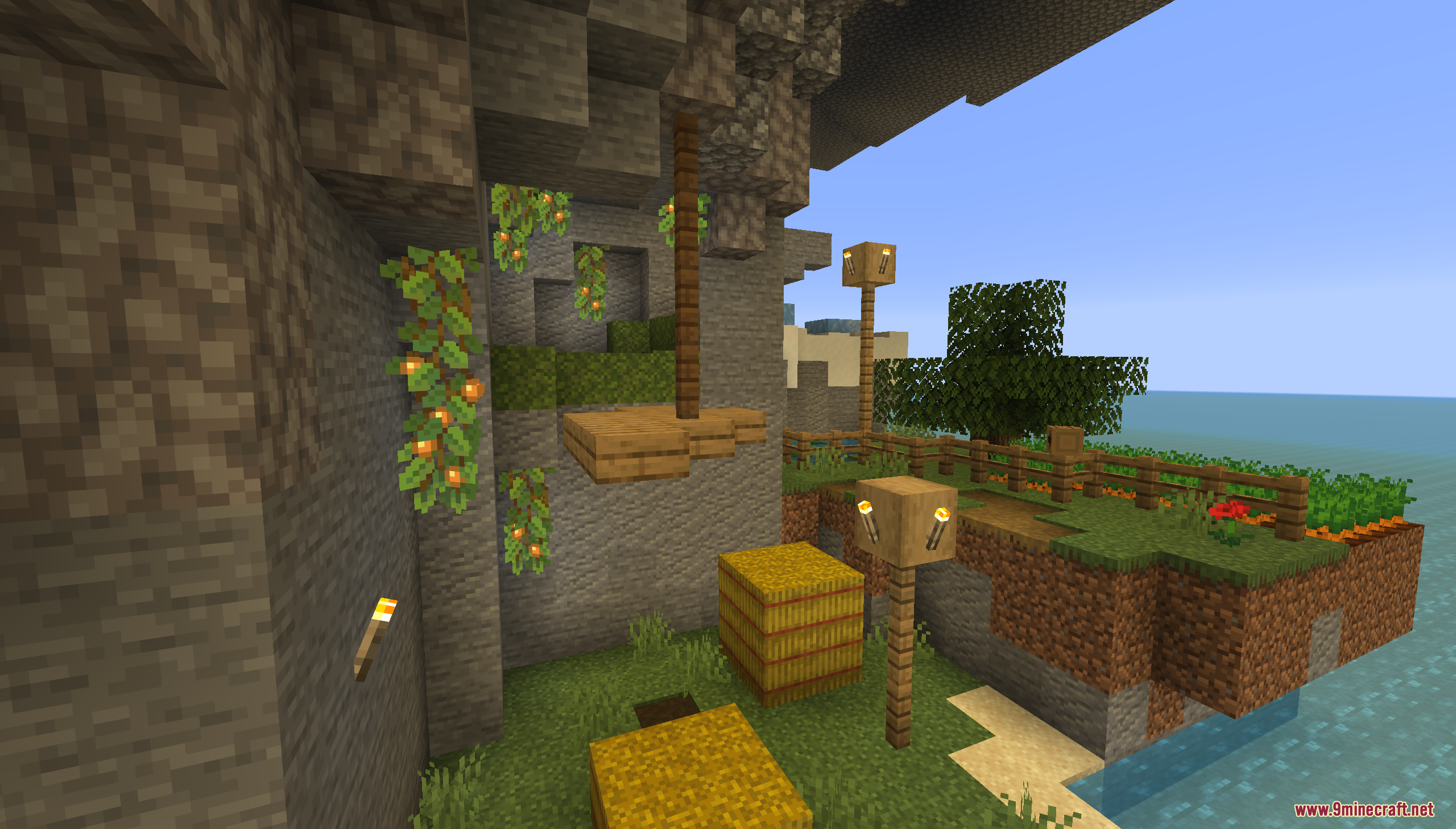 A small farm with a sheep on a floating island
